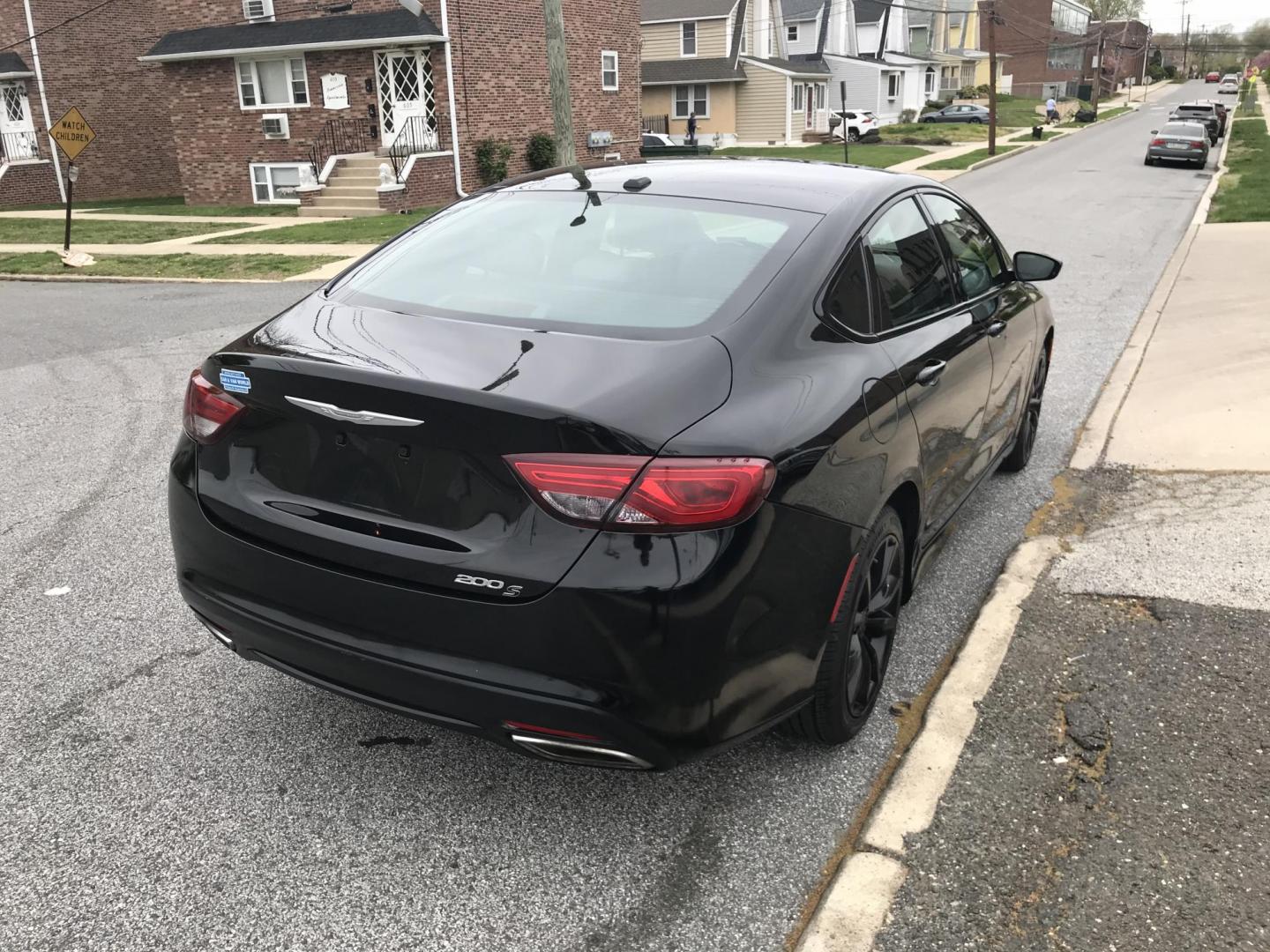 2015 Black /Black Chrysler 200 S (1C3CCCBB3FN) with an 2.4L L4 DOHC 16V engine, 9-Speed Automatic transmission, located at 577 Chester Pike, Prospect Park, PA, 19076, (610) 237-1015, 39.886154, -75.302338 - Photo#2