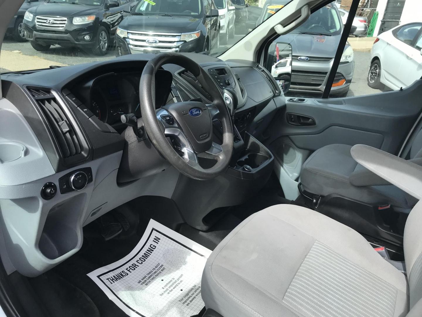 2017 White /Gray Ford Transit 150 Van Low Roof 60/40 Pass. 148-in. WB (1FTYE9ZG2HK) with an 3.5L V6 DOHC 24V engine, 6A transmission, located at 577 Chester Pike, Prospect Park, PA, 19076, (610) 237-1015, 39.886154, -75.302338 - 2017 Ford Transit 150 Extended Body: Ladder racks, shelving, backup camera, partition, FLEET MAINTAINED, runs LIKE NEW! This vehicle comes inspected and has been given a bumper to bumper safety check. It is very clean, reliable, and well maintained. We offer a unique pay plan that is known for be - Photo#6