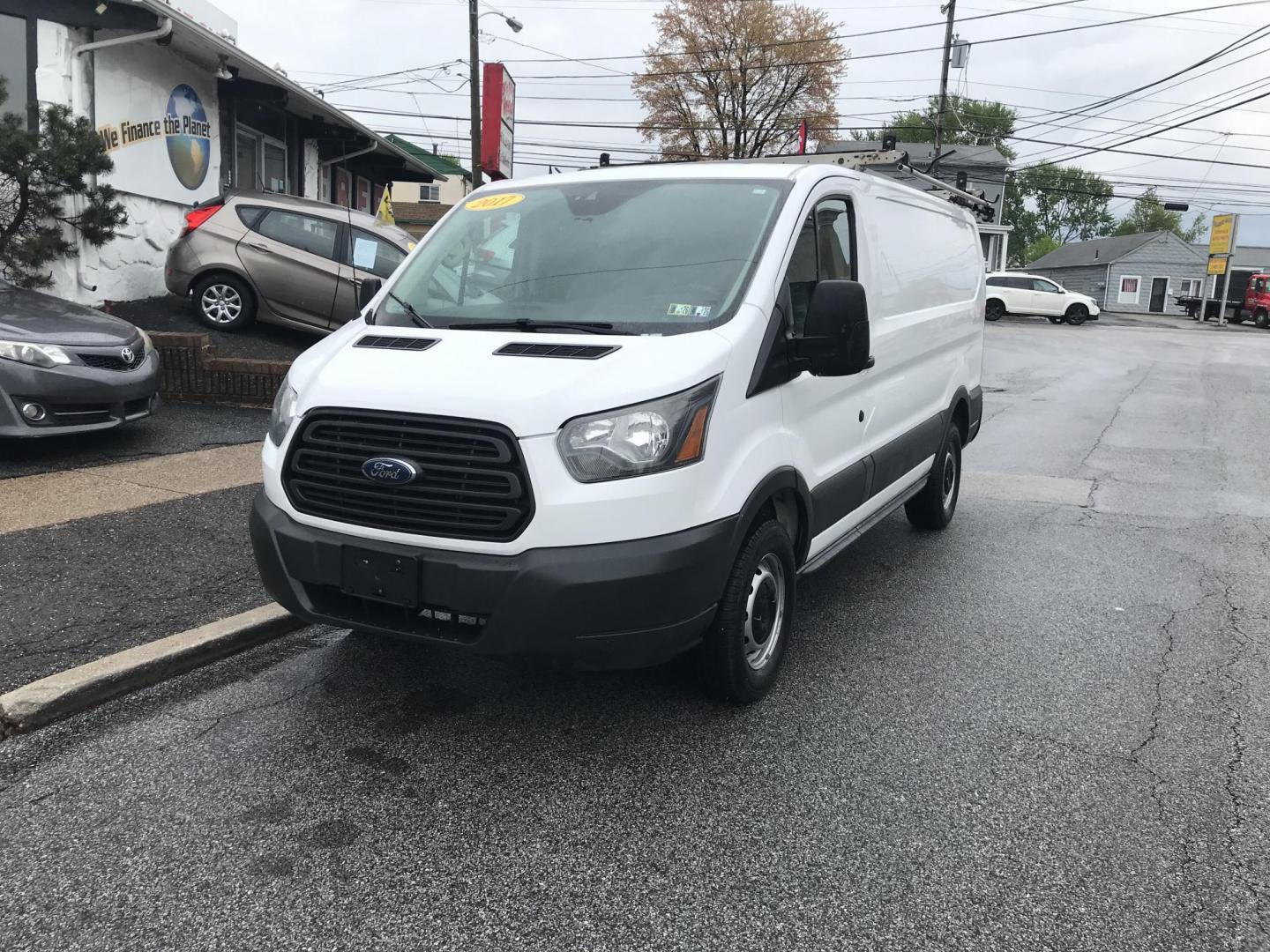 2017 White /Gray Ford Transit 250 Van Low Roof 60/40 Pass.130-in. WB (1FTYR1ZM1HK) with an 3.7L V6 DOHC 24V engine, 6A transmission, located at 577 Chester Pike, Prospect Park, PA, 19076, (610) 237-1015, 39.886154, -75.302338 - 2017 Ford Transit 250: Ladder racks, shelving, backup camera, no side or rear windows, new PA inspection, partition, FLEET MAINTAINED! This vehicle comes inspected and has been given a bumper to bumper safety check. It is very clean, reliable, and well maintained. We offer a unique pay plan that - Photo#2