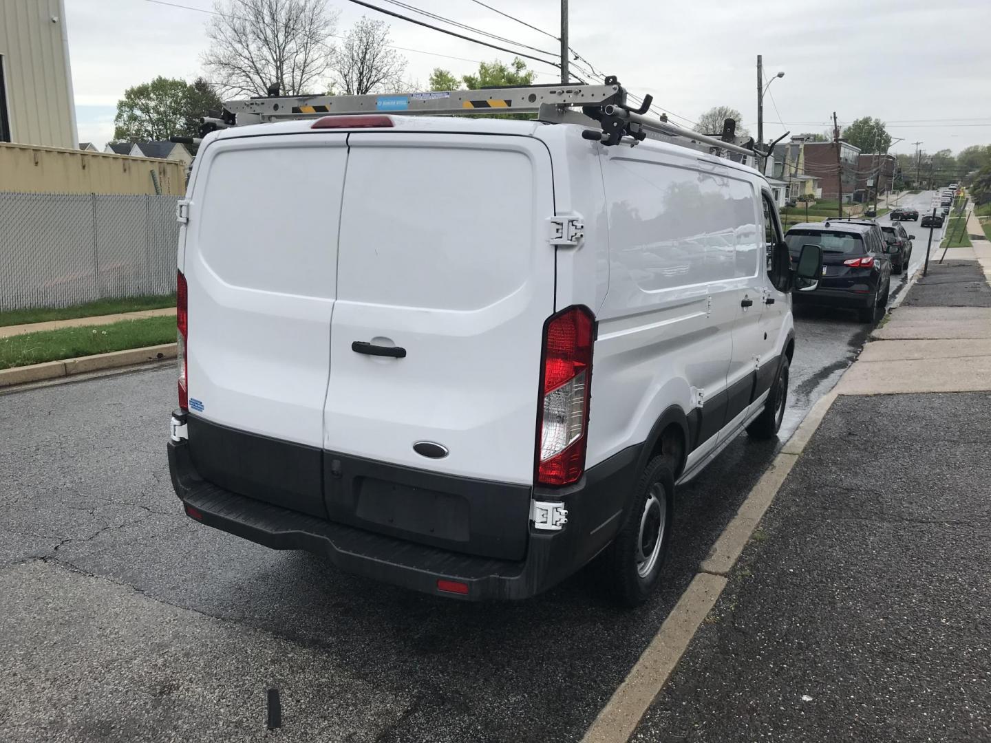 2017 White /Gray Ford Transit 250 Van Low Roof 60/40 Pass.130-in. WB (1FTYR1ZM1HK) with an 3.7L V6 DOHC 24V engine, 6A transmission, located at 577 Chester Pike, Prospect Park, PA, 19076, (610) 237-1015, 39.886154, -75.302338 - 2017 Ford Transit 250: Ladder racks, shelving, backup camera, no side or rear windows, new PA inspection, partition, FLEET MAINTAINED! This vehicle comes inspected and has been given a bumper to bumper safety check. It is very clean, reliable, and well maintained. We offer a unique pay plan that - Photo#3