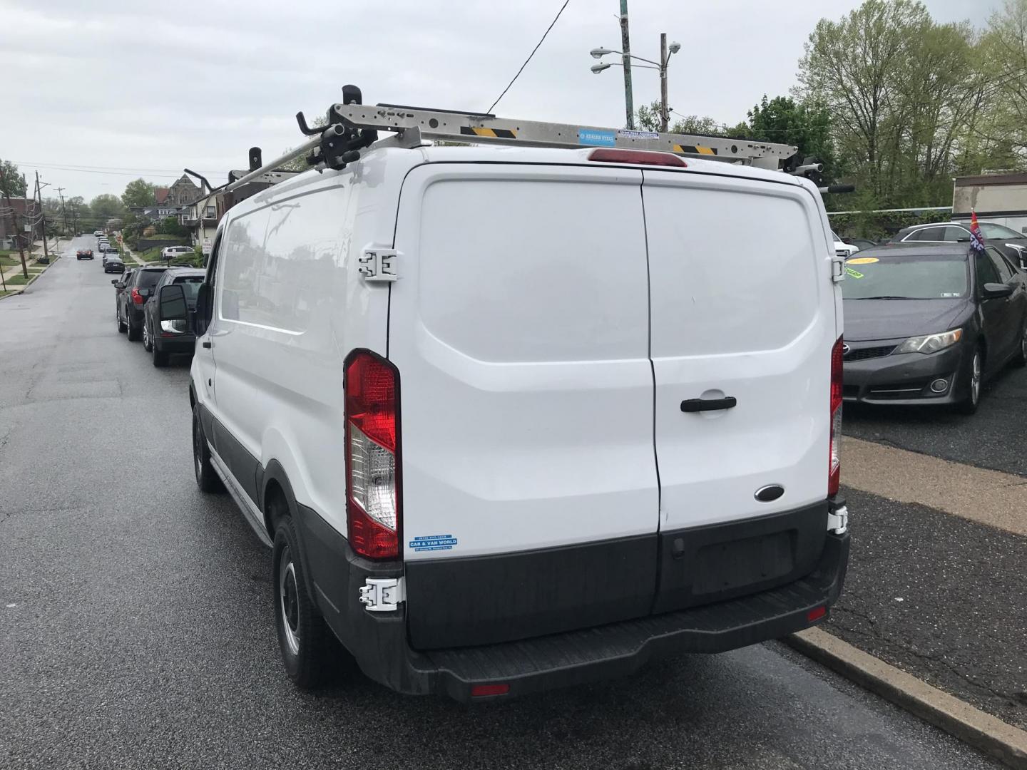 2017 White /Gray Ford Transit 250 Van Low Roof 60/40 Pass.130-in. WB (1FTYR1ZM1HK) with an 3.7L V6 DOHC 24V engine, 6A transmission, located at 577 Chester Pike, Prospect Park, PA, 19076, (610) 237-1015, 39.886154, -75.302338 - 2017 Ford Transit 250: Ladder racks, shelving, backup camera, no side or rear windows, new PA inspection, partition, FLEET MAINTAINED! This vehicle comes inspected and has been given a bumper to bumper safety check. It is very clean, reliable, and well maintained. We offer a unique pay plan that - Photo#4