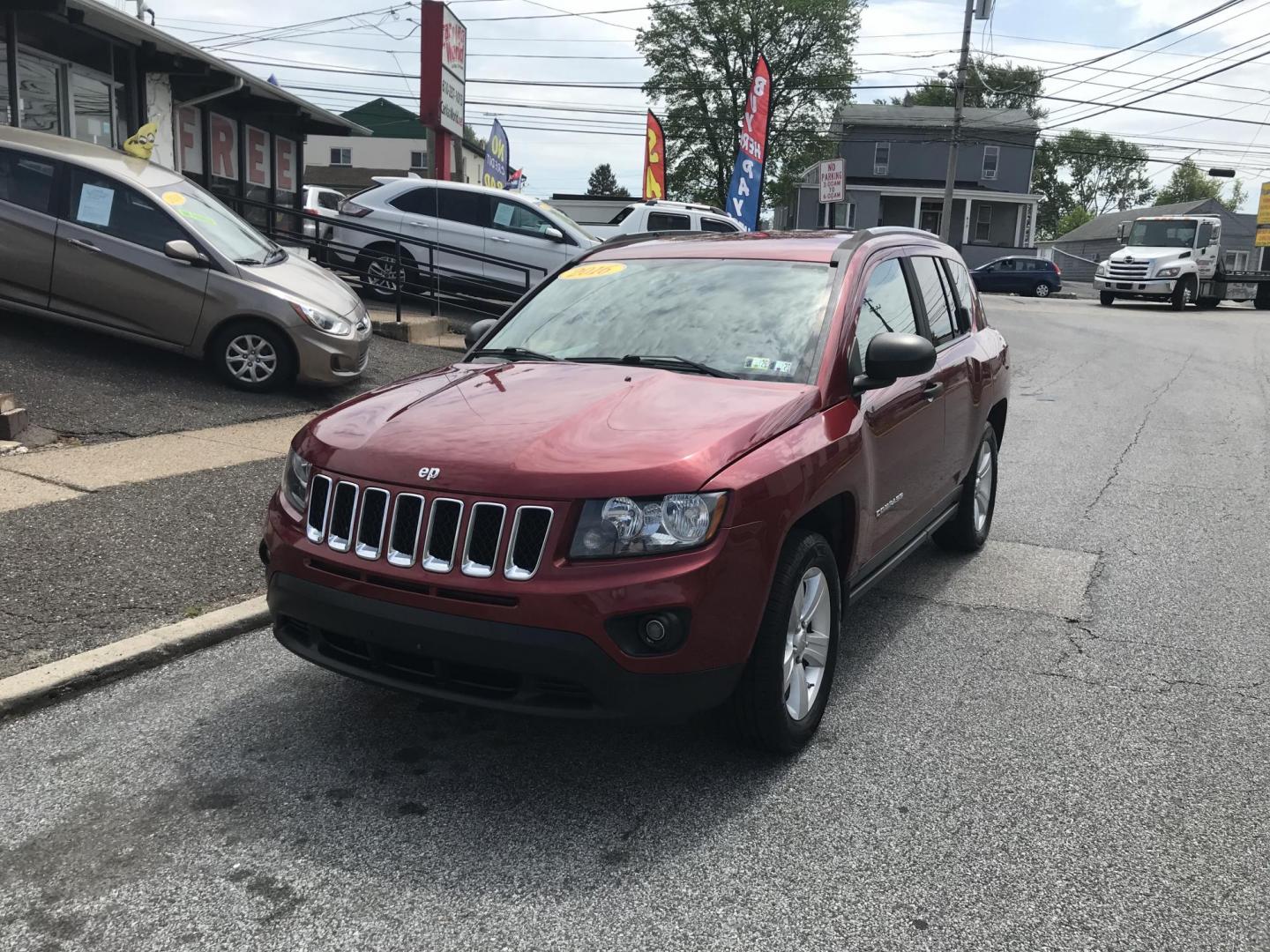 2016 Maroon /Black Jeep Compass Sport 4WD (1C4NJDBB8GD) with an 2.4L L4 DOHC 16V engine, Automatic transmission, located at 577 Chester Pike, Prospect Park, PA, 19076, (610) 237-1015, 39.886154, -75.302338 - 2016 Jeep Compass Sport: Only 126k miles, 4x4, new PA inspection, great on gas, runs LIKE NEW! This vehicle comes inspected and has been given a bumper to bumper safety check. It is very clean, reliable, and well maintained. We offer a unique pay plan that is known for being the easiest and faste - Photo#2