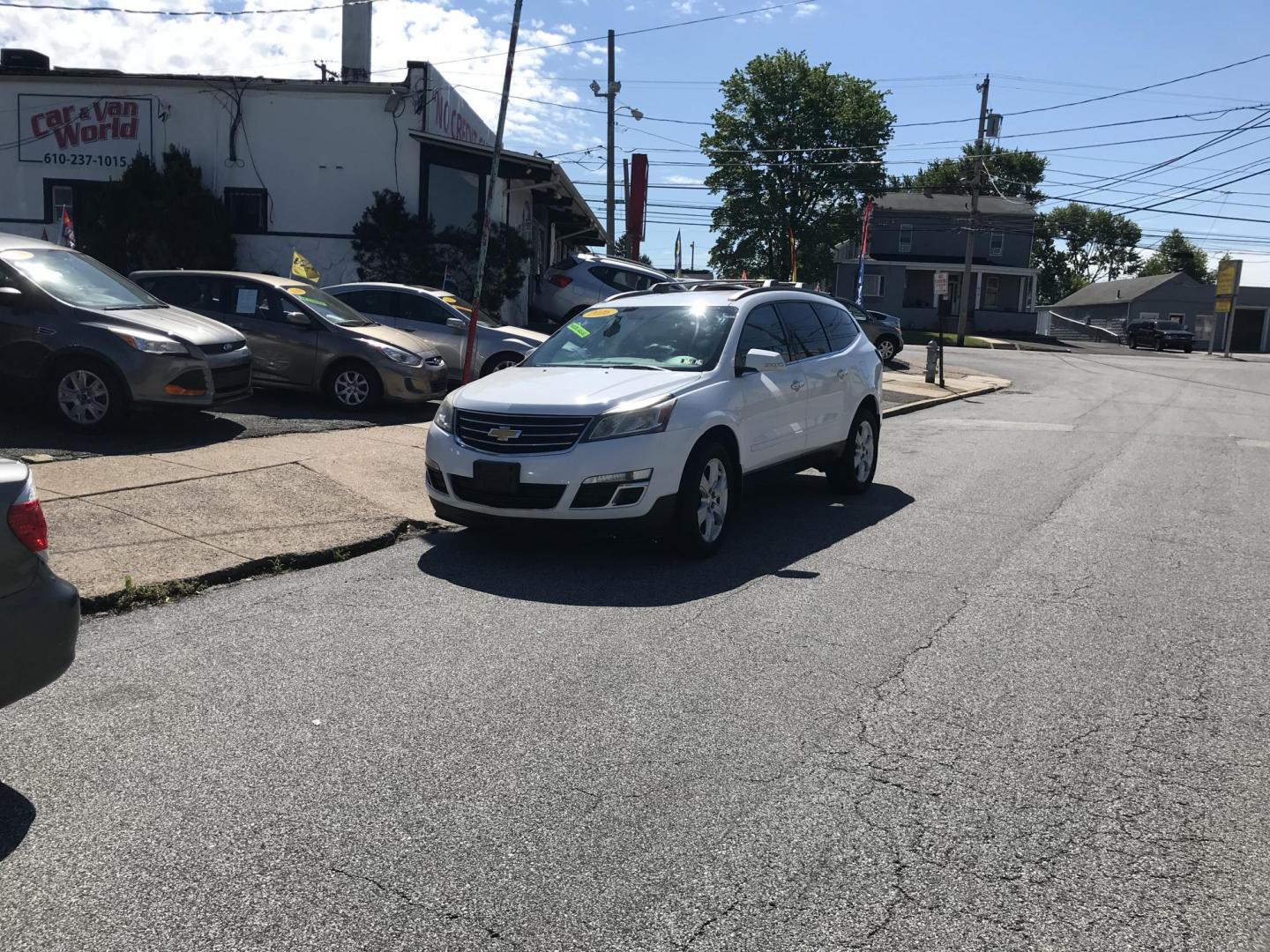 2016 White Chevrolet Traverse 1LT (1GNKRGKD6GJ) with an 3.6L V6 DOHC 24V engine, 6A transmission, located at 577 Chester Pike, Prospect Park, PA, 19076, (610) 237-1015, 39.886154, -75.302338 - 2016 Chevrolet Traverse LT: 3rd row seating, backup camera, heated seats, new PA inspection, SUPER CLEAN, runs LIKE NEW! This vehicle comes inspected and has been given a bumper to bumper safety check. It is very clean, reliable, and well maintained. We offer a unique pay plan that is known for b - Photo#1
