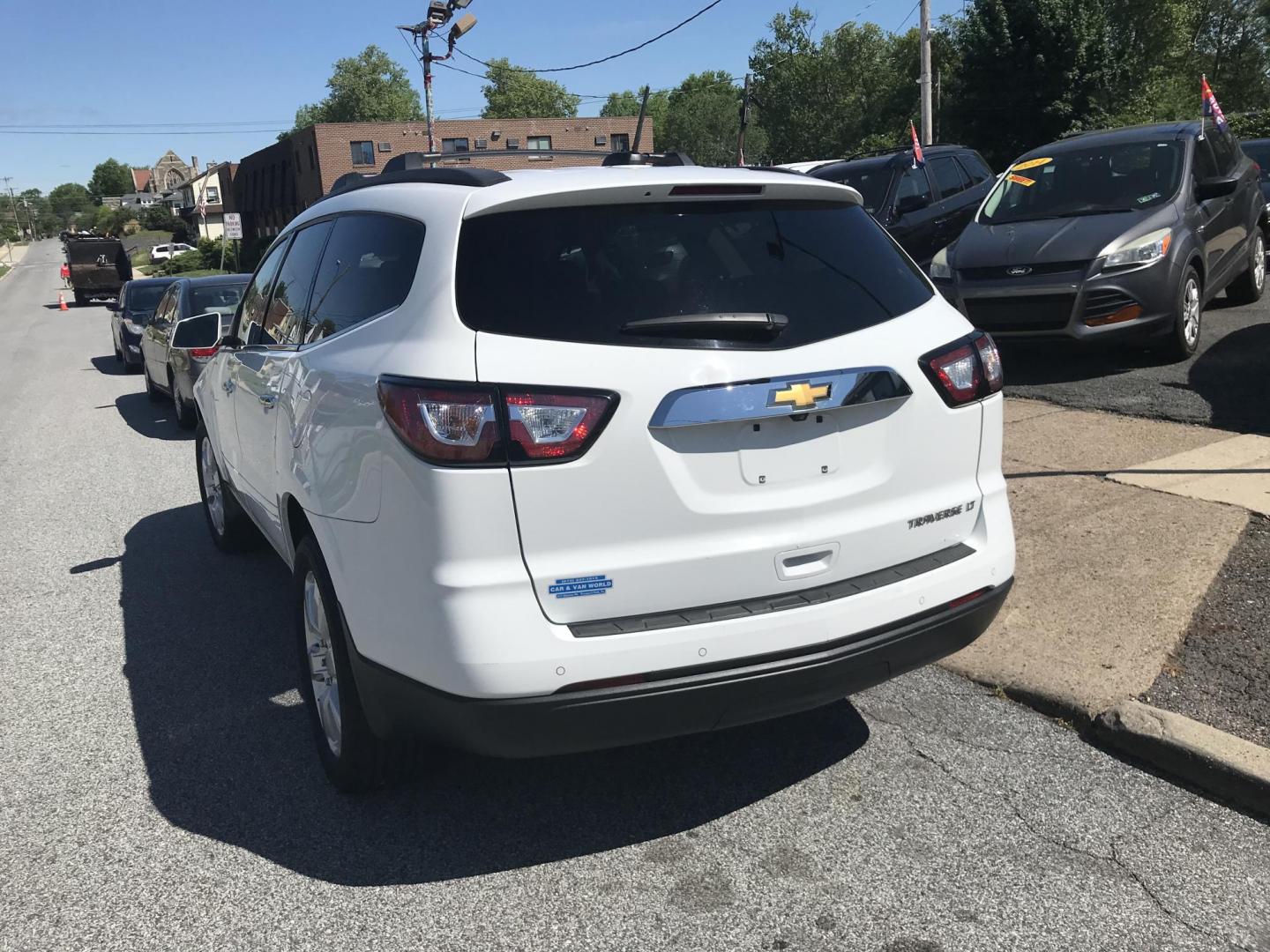 2016 White Chevrolet Traverse 1LT (1GNKRGKD6GJ) with an 3.6L V6 DOHC 24V engine, 6A transmission, located at 577 Chester Pike, Prospect Park, PA, 19076, (610) 237-1015, 39.886154, -75.302338 - 2016 Chevrolet Traverse LT: 3rd row seating, backup camera, heated seats, new PA inspection, SUPER CLEAN, runs LIKE NEW! This vehicle comes inspected and has been given a bumper to bumper safety check. It is very clean, reliable, and well maintained. We offer a unique pay plan that is known for b - Photo#5