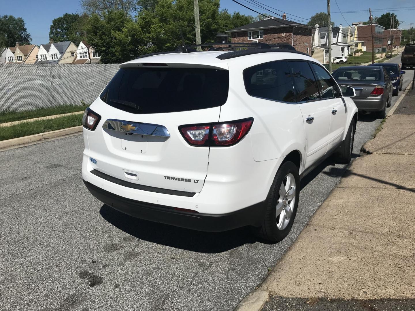 2016 White Chevrolet Traverse 1LT (1GNKRGKD6GJ) with an 3.6L V6 DOHC 24V engine, 6A transmission, located at 577 Chester Pike, Prospect Park, PA, 19076, (610) 237-1015, 39.886154, -75.302338 - 2016 Chevrolet Traverse LT: 3rd row seating, backup camera, heated seats, new PA inspection, SUPER CLEAN, runs LIKE NEW! This vehicle comes inspected and has been given a bumper to bumper safety check. It is very clean, reliable, and well maintained. We offer a unique pay plan that is known for b - Photo#4
