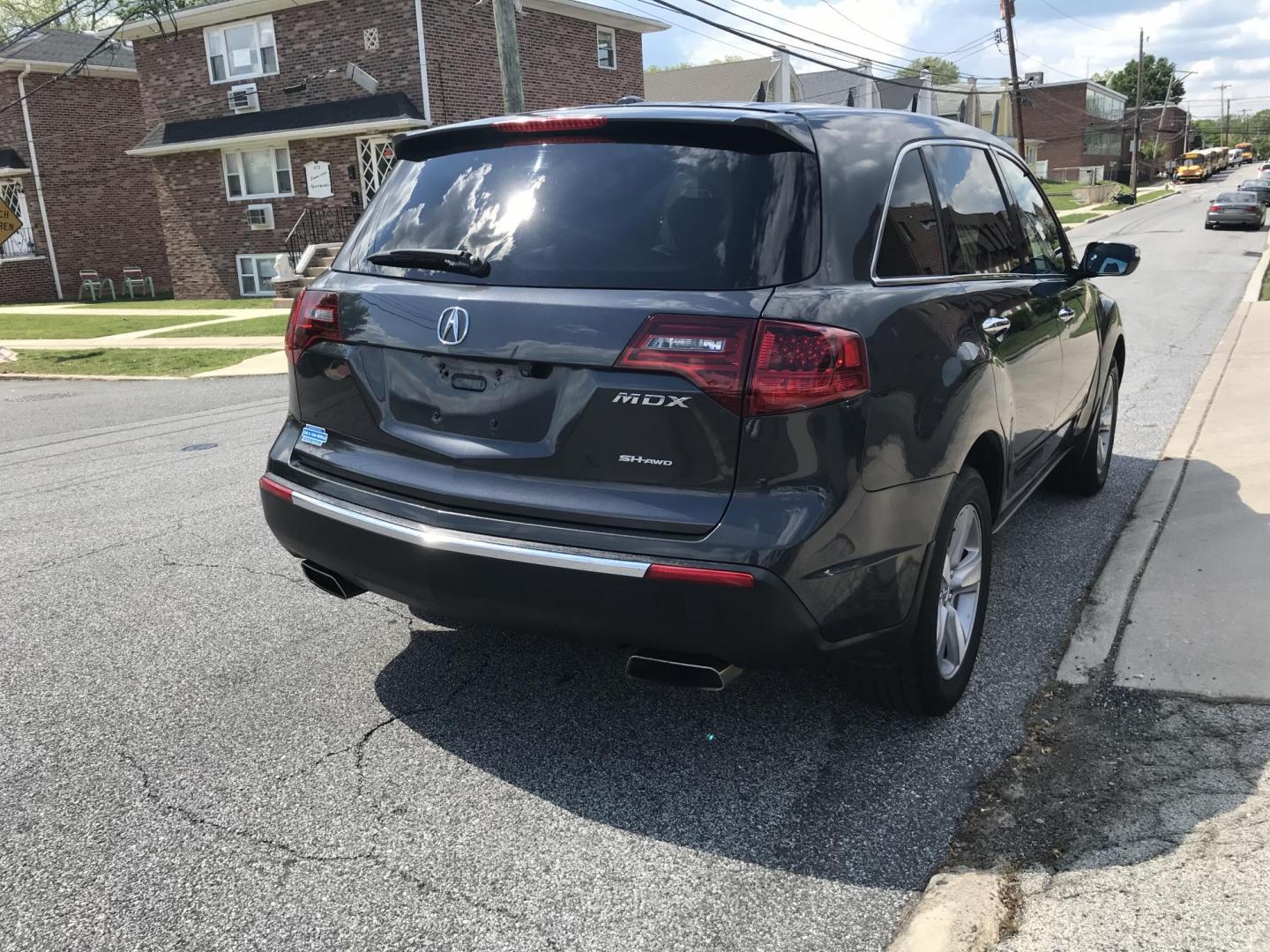 2013 Green /Beige Acura MDX 6-Spd AT w/Tech Package (2HNYD2H32DH) with an 3.5L V6 SOHC 24V engine, 6-Speed Automatic transmission, located at 577 Chester Pike, Prospect Park, PA, 19076, (610) 237-1015, 39.886154, -75.302338 - 2013 Acura MDX: 3rd row seating, navigation system, backup camera, AWD, sunroof, heated seats, SUPER CLEAN, runs LIKE NEW! This vehicle comes inspected and has been given a bumper to bumper safety check. It is very clean, reliable, and well maintained. We offer a unique pay plan that is known for - Photo#4