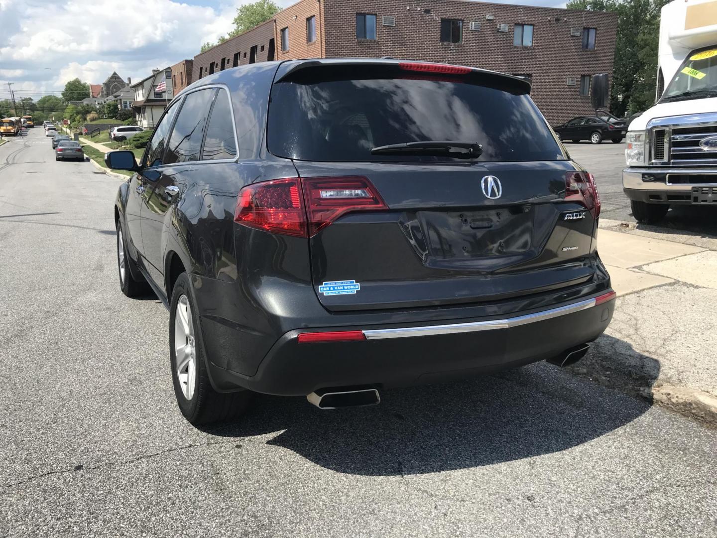 2013 Green /Beige Acura MDX 6-Spd AT w/Tech Package (2HNYD2H32DH) with an 3.5L V6 SOHC 24V engine, 6-Speed Automatic transmission, located at 577 Chester Pike, Prospect Park, PA, 19076, (610) 237-1015, 39.886154, -75.302338 - 2013 Acura MDX: 3rd row seating, navigation system, backup camera, AWD, sunroof, heated seats, SUPER CLEAN, runs LIKE NEW! This vehicle comes inspected and has been given a bumper to bumper safety check. It is very clean, reliable, and well maintained. We offer a unique pay plan that is known for - Photo#5