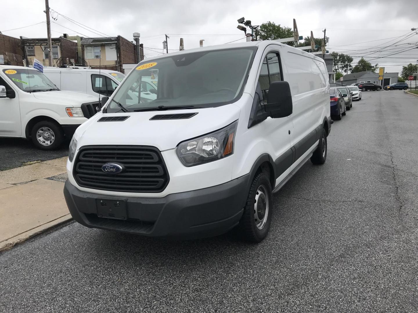 2018 White /Gray Ford Transit 150 Van Low Roof 60/40 Pass. 148-in. WB (1FTYE9ZG7JK) with an 3.5L V6 DOHC 24V engine, 6A transmission, located at 577 Chester Pike, Prospect Park, PA, 19076, (610) 237-1015, 39.886154, -75.302338 - 2018 Ford Transit 150: Extended body, ladder racks, shelving, backup camera, no side or rear windows, SUPER CLEAN, FLEET MAINTAINED! This vehicle comes inspected and has been given a bumper to bumper safety check. It is very clean, reliable, and well maintained. We offer a unique pay plan that is - Photo#2