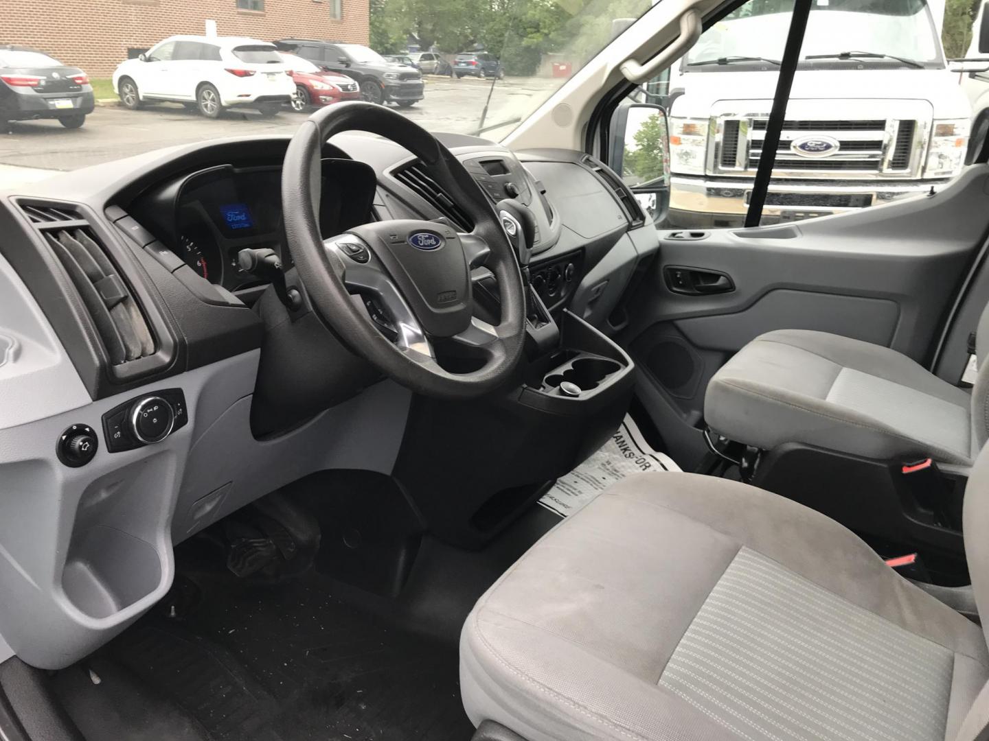 2018 White /Gray Ford Transit 150 Van Low Roof 60/40 Pass. 148-in. WB (1FTYE9ZG7JK) with an 3.5L V6 DOHC 24V engine, 6A transmission, located at 577 Chester Pike, Prospect Park, PA, 19076, (610) 237-1015, 39.886154, -75.302338 - 2018 Ford Transit 150: Extended body, ladder racks, shelving, backup camera, no side or rear windows, SUPER CLEAN, FLEET MAINTAINED! This vehicle comes inspected and has been given a bumper to bumper safety check. It is very clean, reliable, and well maintained. We offer a unique pay plan that is - Photo#6
