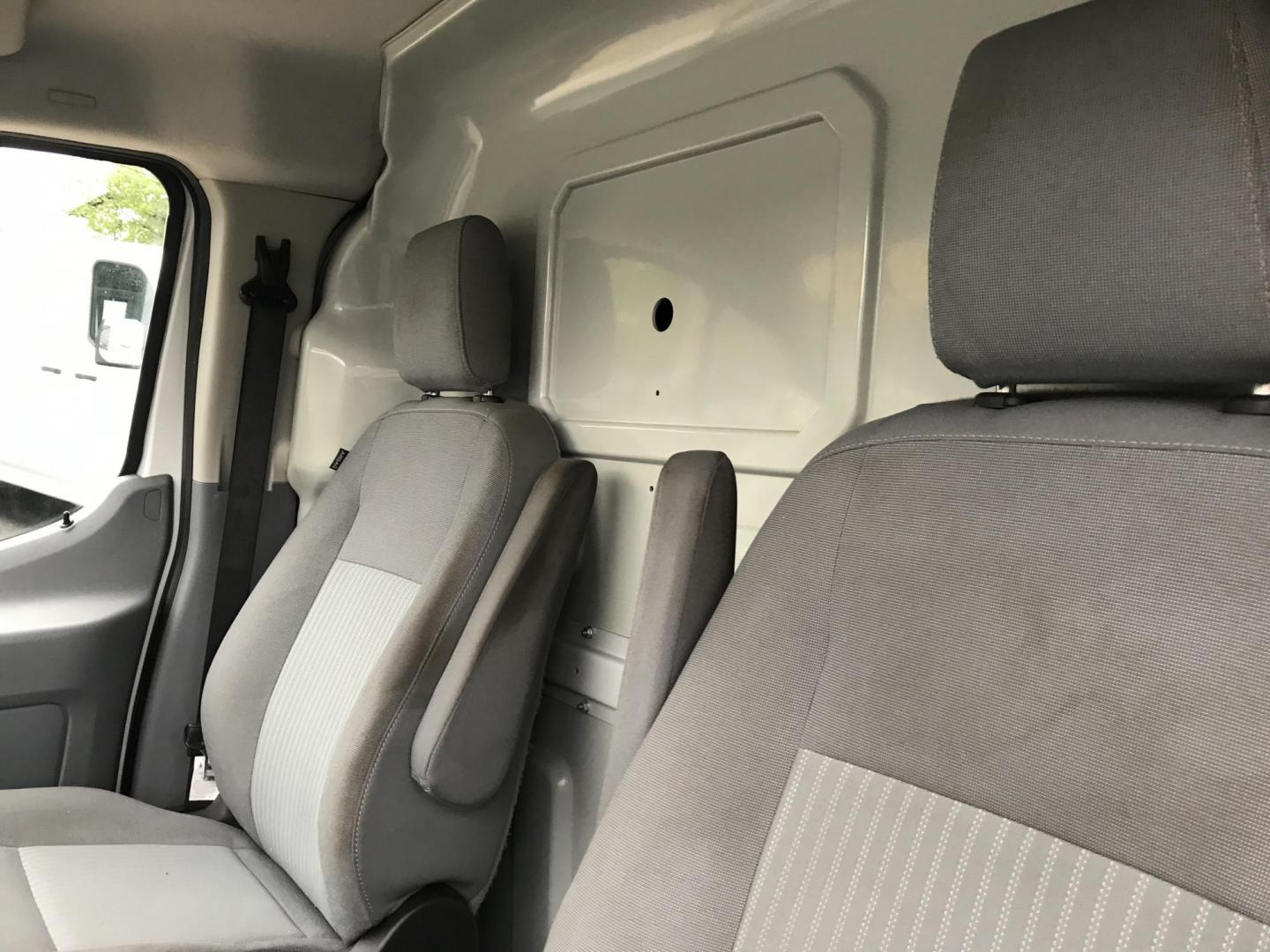 2018 White /Gray Ford Transit 150 Van Low Roof 60/40 Pass. 148-in. WB (1FTYE9ZG7JK) with an 3.5L V6 DOHC 24V engine, 6A transmission, located at 577 Chester Pike, Prospect Park, PA, 19076, (610) 237-1015, 39.886154, -75.302338 - 2018 Ford Transit 150: Extended body, ladder racks, shelving, backup camera, no side or rear windows, SUPER CLEAN, FLEET MAINTAINED! This vehicle comes inspected and has been given a bumper to bumper safety check. It is very clean, reliable, and well maintained. We offer a unique pay plan that is - Photo#9