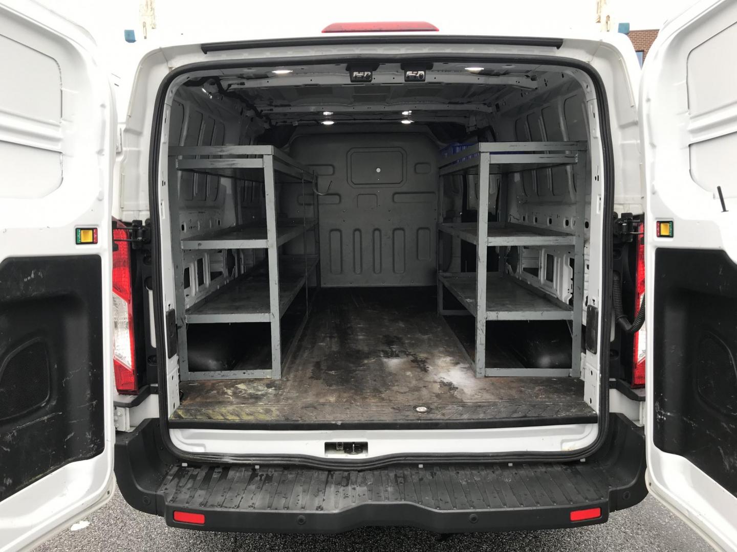 2018 White /Gray Ford Transit 150 Van Low Roof 60/40 Pass. 148-in. WB (1FTYE9ZG7JK) with an 3.5L V6 DOHC 24V engine, 6A transmission, located at 577 Chester Pike, Prospect Park, PA, 19076, (610) 237-1015, 39.886154, -75.302338 - 2018 Ford Transit 150: Extended body, ladder racks, shelving, backup camera, no side or rear windows, SUPER CLEAN, FLEET MAINTAINED! This vehicle comes inspected and has been given a bumper to bumper safety check. It is very clean, reliable, and well maintained. We offer a unique pay plan that is - Photo#14