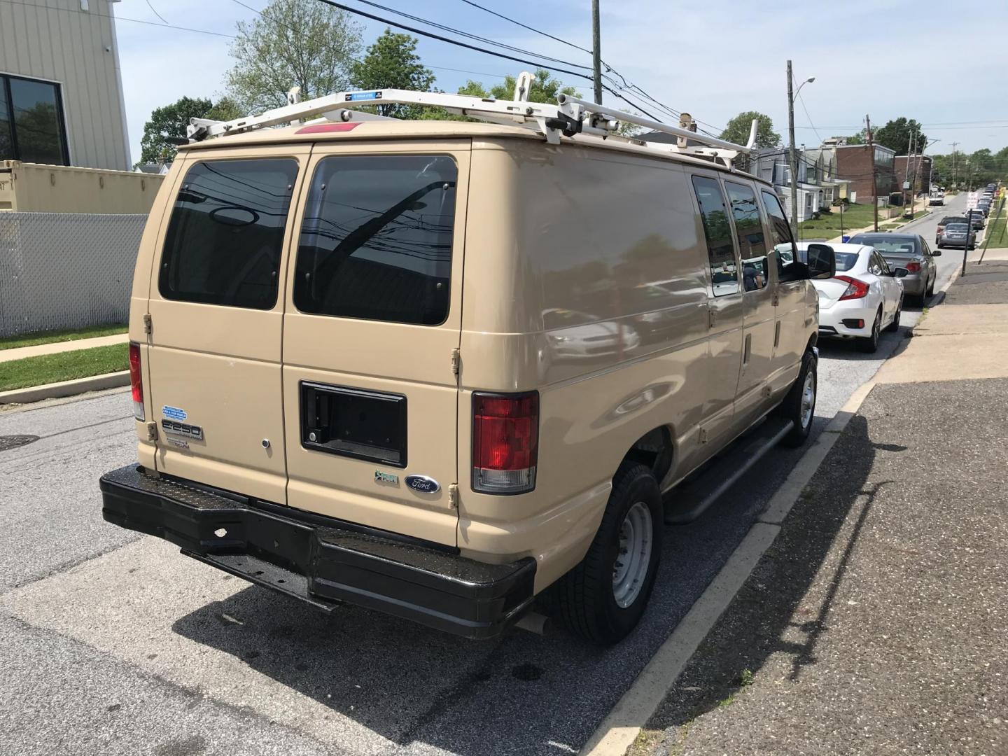 2013 Tan /Gray Ford E-Series Van E-250 (1FTNE2EW0DD) with an 4.6L V8 SOHC 16V engine, 4-Speed Automatic transmission, located at 577 Chester Pike, Prospect Park, PA, 19076, (610) 237-1015, 39.886154, -75.302338 - 2013 Ford Econoline E250 Cargo Van: 4 new tires, ladder racks, shelving, new PA inspection, FLEET MAINTAINED, runs LIKE NEW! This vehicle comes inspected and has been given a bumper to bumper safety check. It is very clean, reliable, and well maintained. We offer a unique pay plan that is known f - Photo#4
