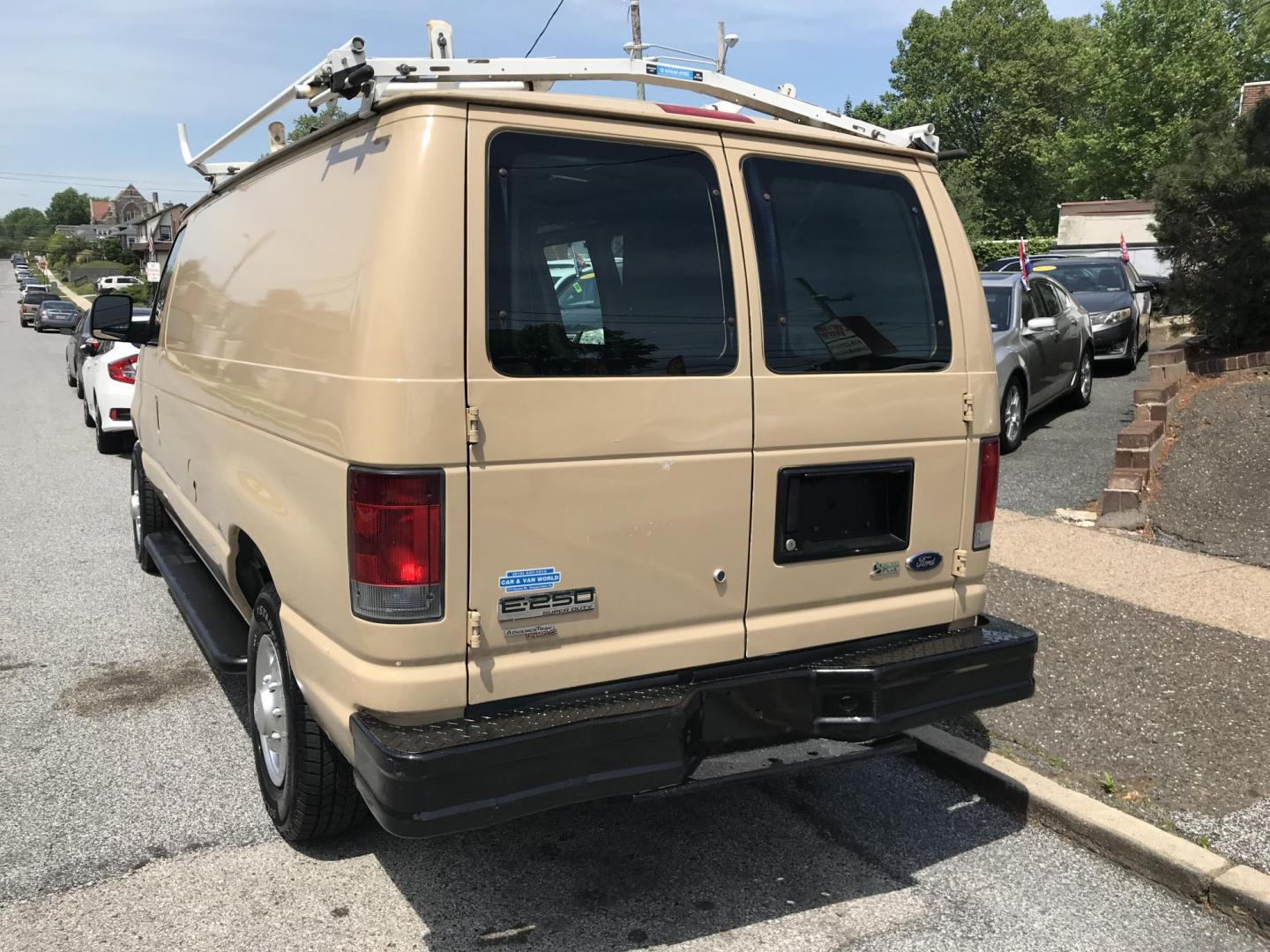 2013 Tan /Gray Ford E-Series Van E-250 (1FTNE2EW0DD) with an 4.6L V8 SOHC 16V engine, 4-Speed Automatic transmission, located at 577 Chester Pike, Prospect Park, PA, 19076, (610) 237-1015, 39.886154, -75.302338 - 2013 Ford Econoline E250 Cargo Van: 4 new tires, ladder racks, shelving, new PA inspection, FLEET MAINTAINED, runs LIKE NEW! This vehicle comes inspected and has been given a bumper to bumper safety check. It is very clean, reliable, and well maintained. We offer a unique pay plan that is known f - Photo#5