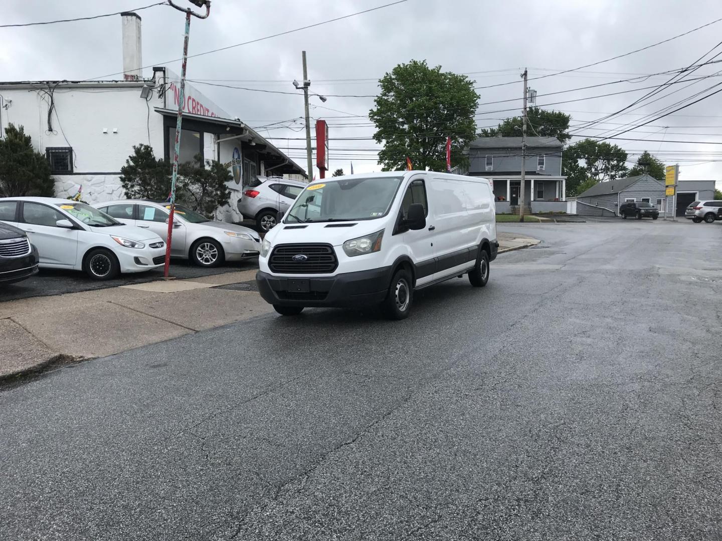 2016 White /Gray Ford Transit 150 Van Low Roof 60/40 Pass. 148-in. WB (1FTYE9ZG1GK) with an 3.5L V6 DOHC 24V engine, 6A transmission, located at 577 Chester Pike, Prospect Park, PA, 19076, (610) 237-1015, 39.886154, -75.302338 - 2016 Ford Transit 150: Extended body, backup camera, no side or rear windows, shelving, partition, FLEET MAINTAINED, RUNS LIKE NEW! This vehicle comes inspected and has been given a bumper to bumper safety check. It is very clean, reliable, and well maintained. We offer a unique pay plan that is - Photo#1