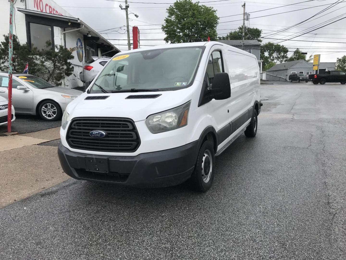 2016 White /Gray Ford Transit 150 Van Low Roof 60/40 Pass. 148-in. WB (1FTYE9ZG1GK) with an 3.5L V6 DOHC 24V engine, 6A transmission, located at 577 Chester Pike, Prospect Park, PA, 19076, (610) 237-1015, 39.886154, -75.302338 - 2016 Ford Transit 150: Extended body, backup camera, no side or rear windows, shelving, partition, FLEET MAINTAINED, RUNS LIKE NEW! This vehicle comes inspected and has been given a bumper to bumper safety check. It is very clean, reliable, and well maintained. We offer a unique pay plan that is - Photo#2