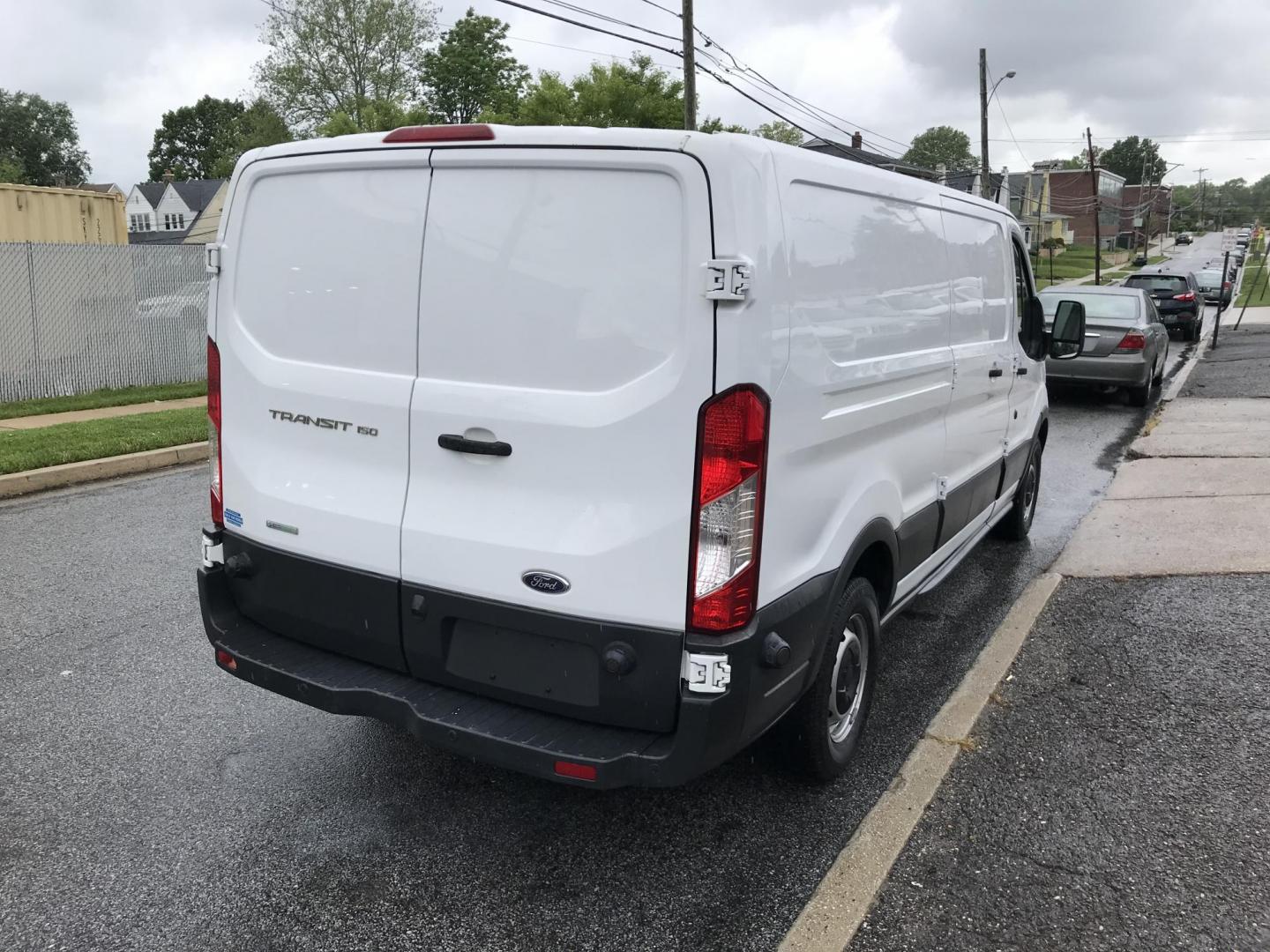 2016 White /Gray Ford Transit 150 Van Low Roof 60/40 Pass. 148-in. WB (1FTYE9ZG1GK) with an 3.5L V6 DOHC 24V engine, 6A transmission, located at 577 Chester Pike, Prospect Park, PA, 19076, (610) 237-1015, 39.886154, -75.302338 - 2016 Ford Transit 150: Extended body, backup camera, no side or rear windows, shelving, partition, FLEET MAINTAINED, RUNS LIKE NEW! This vehicle comes inspected and has been given a bumper to bumper safety check. It is very clean, reliable, and well maintained. We offer a unique pay plan that is - Photo#4