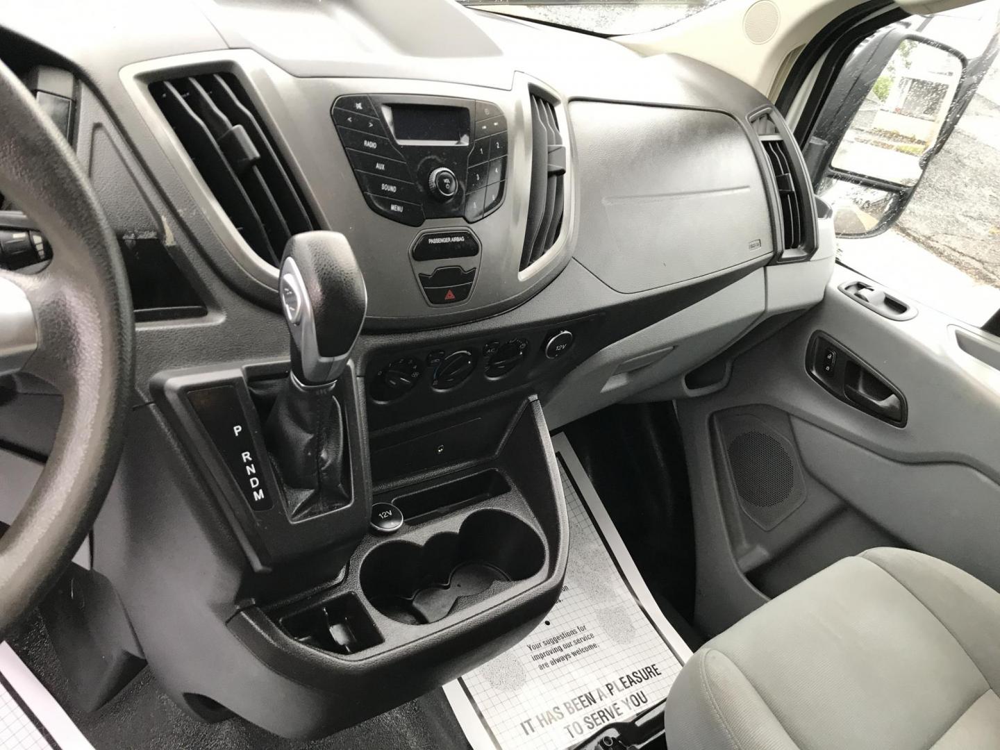 2016 White /Gray Ford Transit 150 Van Low Roof 60/40 Pass. 148-in. WB (1FTYE9ZG1GK) with an 3.5L V6 DOHC 24V engine, 6A transmission, located at 577 Chester Pike, Prospect Park, PA, 19076, (610) 237-1015, 39.886154, -75.302338 - 2016 Ford Transit 150: Extended body, backup camera, no side or rear windows, shelving, partition, FLEET MAINTAINED, RUNS LIKE NEW! This vehicle comes inspected and has been given a bumper to bumper safety check. It is very clean, reliable, and well maintained. We offer a unique pay plan that is - Photo#13