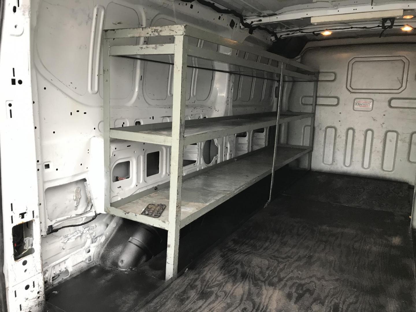 2016 White /Gray Ford Transit 150 Van Low Roof 60/40 Pass. 148-in. WB (1FTYE9ZG1GK) with an 3.5L V6 DOHC 24V engine, 6A transmission, located at 577 Chester Pike, Prospect Park, PA, 19076, (610) 237-1015, 39.886154, -75.302338 - 2016 Ford Transit 150: Extended body, backup camera, no side or rear windows, shelving, partition, FLEET MAINTAINED, RUNS LIKE NEW! This vehicle comes inspected and has been given a bumper to bumper safety check. It is very clean, reliable, and well maintained. We offer a unique pay plan that is - Photo#16