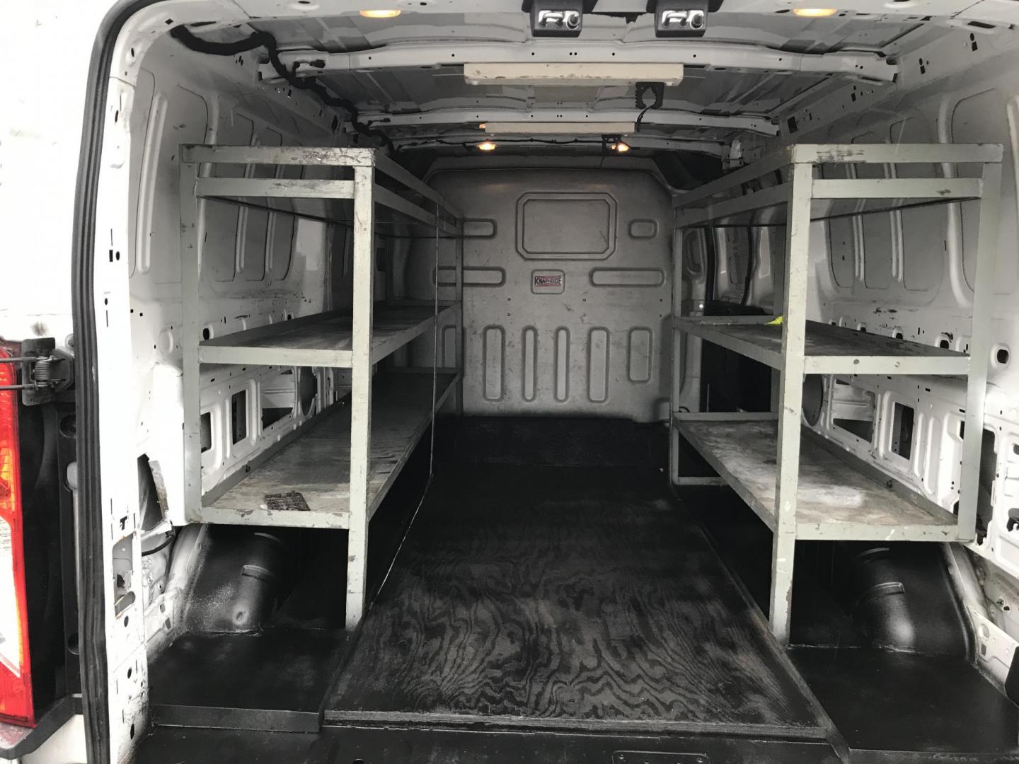 2016 White /Gray Ford Transit 150 Van Low Roof 60/40 Pass. 148-in. WB (1FTYE9ZG1GK) with an 3.5L V6 DOHC 24V engine, 6A transmission, located at 577 Chester Pike, Prospect Park, PA, 19076, (610) 237-1015, 39.886154, -75.302338 - 2016 Ford Transit 150: Extended body, backup camera, no side or rear windows, shelving, partition, FLEET MAINTAINED, RUNS LIKE NEW! This vehicle comes inspected and has been given a bumper to bumper safety check. It is very clean, reliable, and well maintained. We offer a unique pay plan that is - Photo#15