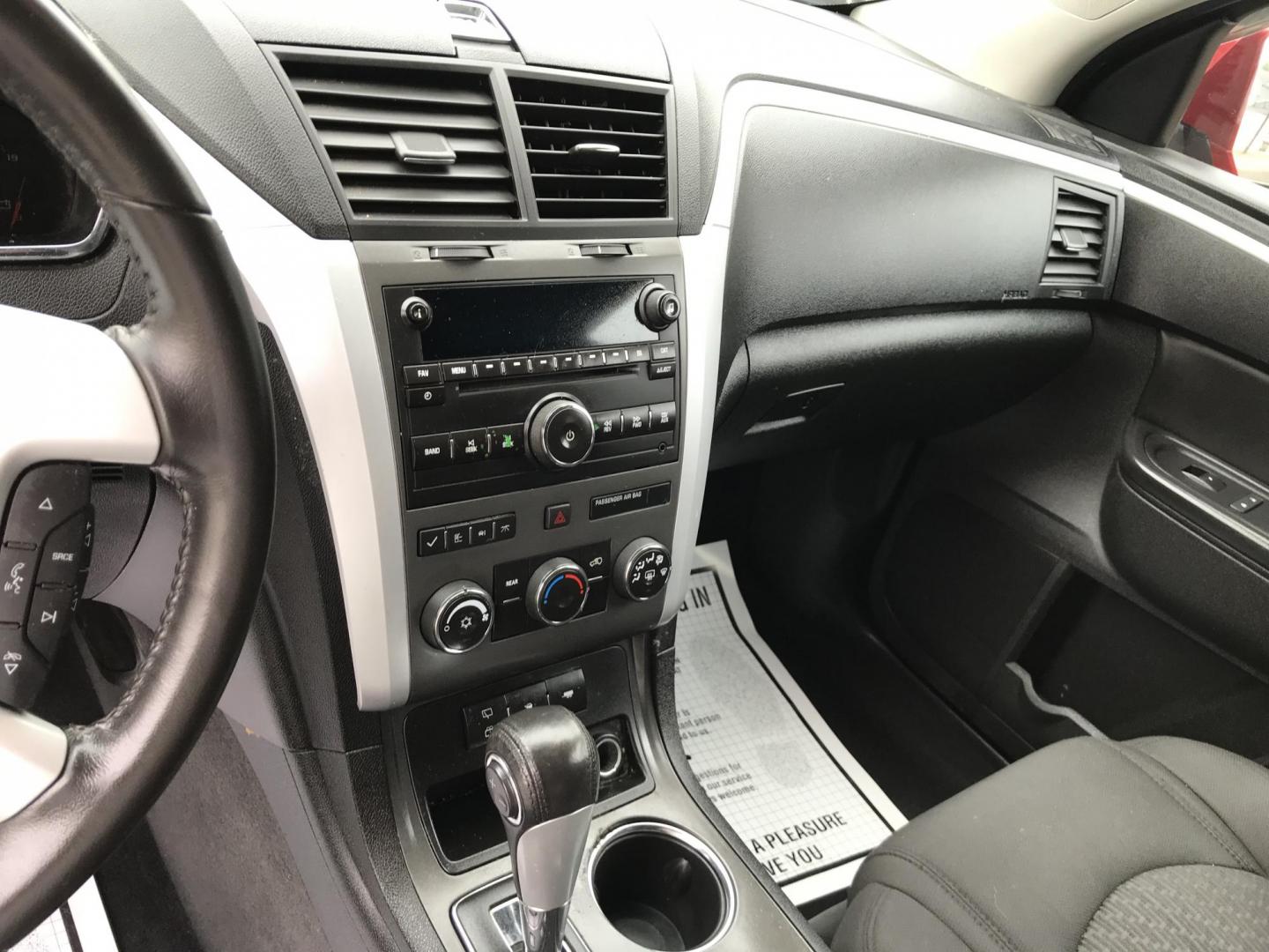 2012 Red /Gray Chevrolet Traverse LT AWD (1GNKVGED9CJ) with an 3.6L V6 DOHC 24V engine, 6-Speed Automatic transmission, located at 577 Chester Pike, Prospect Park, PA, 19076, (610) 237-1015, 39.886154, -75.302338 - 2012 Chevy Traverse LT: AWD, 3rd row seating, backup camera, new PA inspection, SUPER CLEAN, runs LIKE NEW! This vehicle comes inspected and has been given a bumper to bumper safety check. It is very clean, reliable, and well maintained. We offer a unique pay plan that is known for being the easi - Photo#12