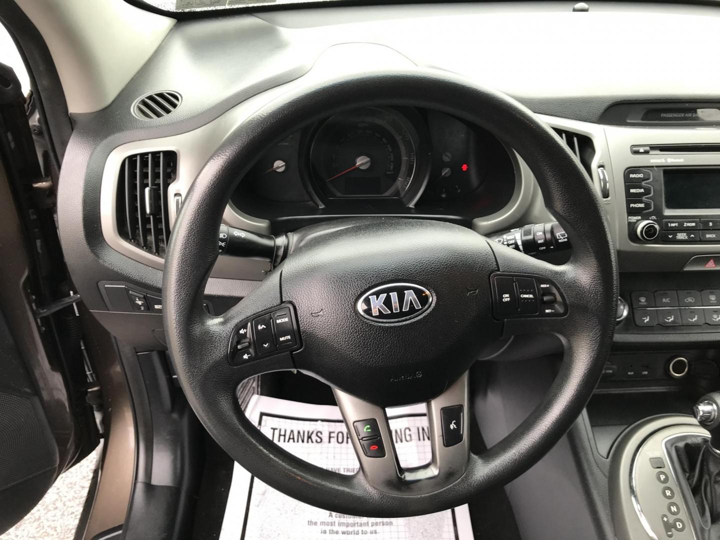 2014 Brown /Black Kia Sportage LX (KNDPB3AC5E7) with an 2.4L V6 DOHC 24V engine, 6-Speed Automatic transmission, located at 577 Chester Pike, Prospect Park, PA, 19076, (610) 237-1015, 39.886154, -75.302338 - 2014 Kia Sportage LX: great on gas, new PA inspection, SUPER CLEAN, runs LIKE NEW! This vehicle comes inspected and has been given a bumper to bumper safety check. It is very clean, reliable, and well maintained. We offer a unique pay plan that is known for being the easiest and fastest financing - Photo#11