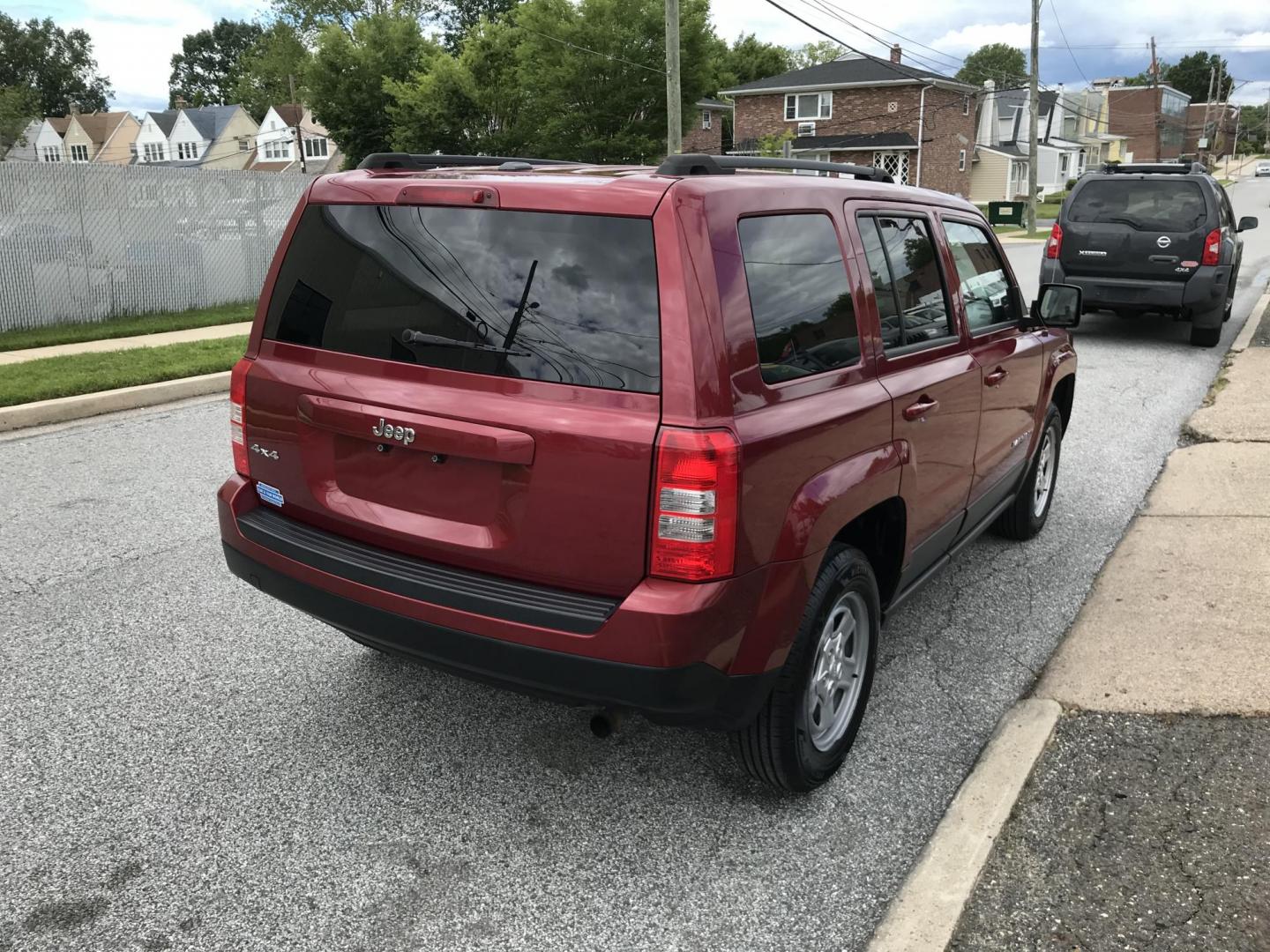 2016 Red /Gray Jeep Patriot Sport 4WD (1C4NJRBB7GD) with an 2.4L L4 DOHC 16V engine, Automatic transmission, located at 577 Chester Pike, Prospect Park, PA, 19076, (610) 237-1015, 39.886154, -75.302338 - 2016 Jeep Patriot Sport: remote start, 4x4, new PA inspection, great on gas, SUPER CLEAN, runs LIKE NEW! This vehicle comes inspected and has been given a bumper to bumper safety check. It is very clean, reliable, and well maintained. We offer a unique pay plan that is known for being the easiest - Photo#4