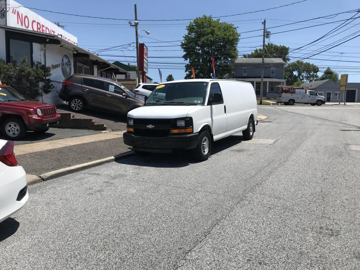 2011 White /Gray Chevrolet Express 2500 Cargo Extended (1GCWGGCG8B1) with an 6.0L V8 OHV 16V FFV engine, 4-Speed Automatic transmission, located at 577 Chester Pike, Prospect Park, PA, 19076, (610) 237-1015, 39.886154, -75.302338 - 2011 Chevy Express 2500 Extended Body: Has shelving, new PA inspection, SUPER CLEAN, FLEET MAINTAINED! This vehicle comes inspected and has been given a bumper to bumper safety check. It is very clean, reliable, and well maintained. We offer a unique pay plan that is known for being the easiest a - Photo#1