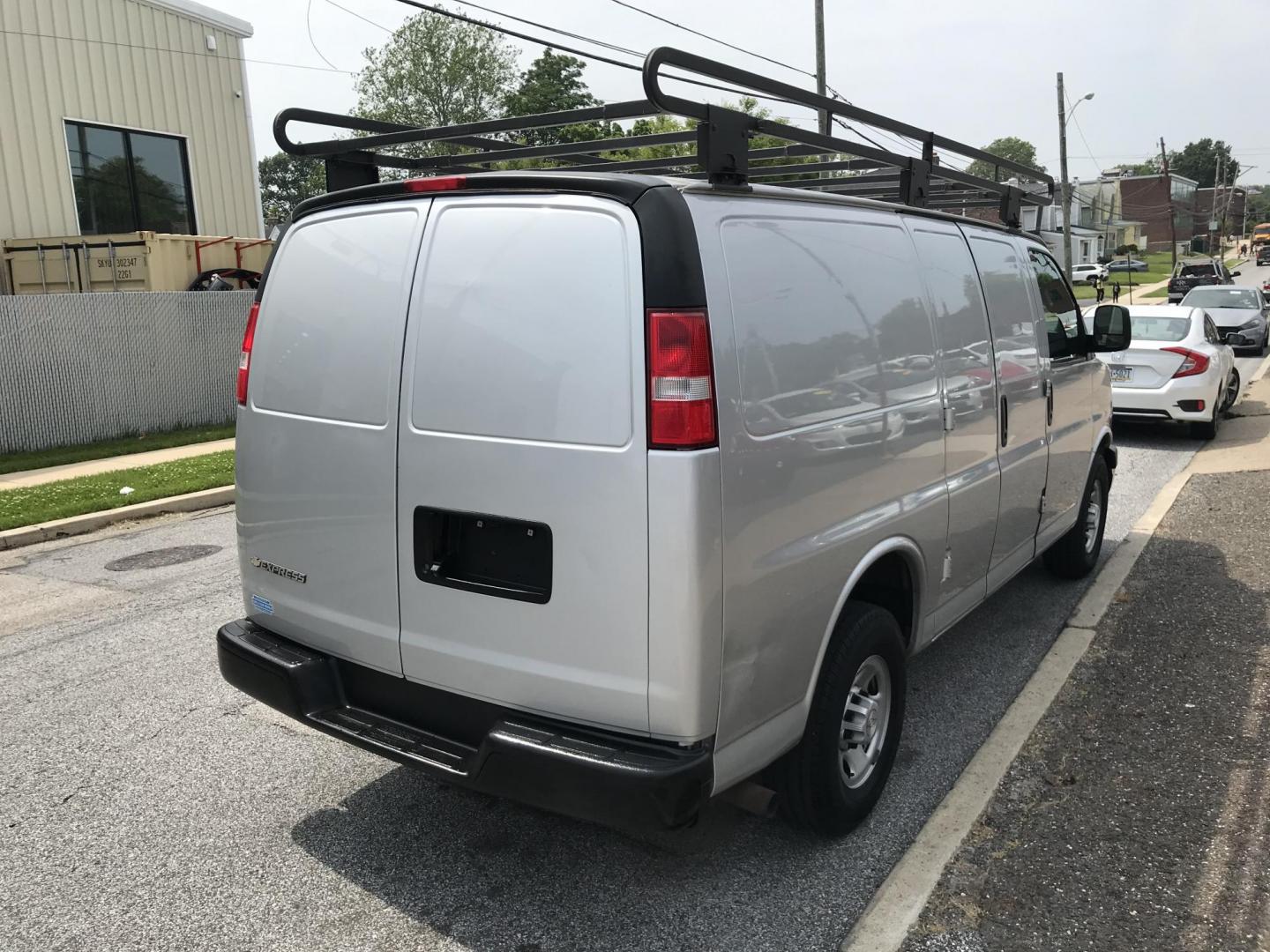 2018 Silver /Gray Chevrolet Express 3500 Cargo (1GCZGGFG3J1) with an 6.0L V8 OHV 16V FFV engine, 6A transmission, located at 577 Chester Pike, Prospect Park, PA, 19076, (610) 237-1015, 39.886154, -75.302338 - 2018 Chevrolet Express 3500 Cargo Van: Ladder racks, shelving, no side or rear windows, new PA inspection, runs LIKE NEW! This vehicle comes inspected and has been given a bumper to bumper safety check. It is very clean, reliable, and well maintained. We offer a unique pay plan that is known for - Photo#4