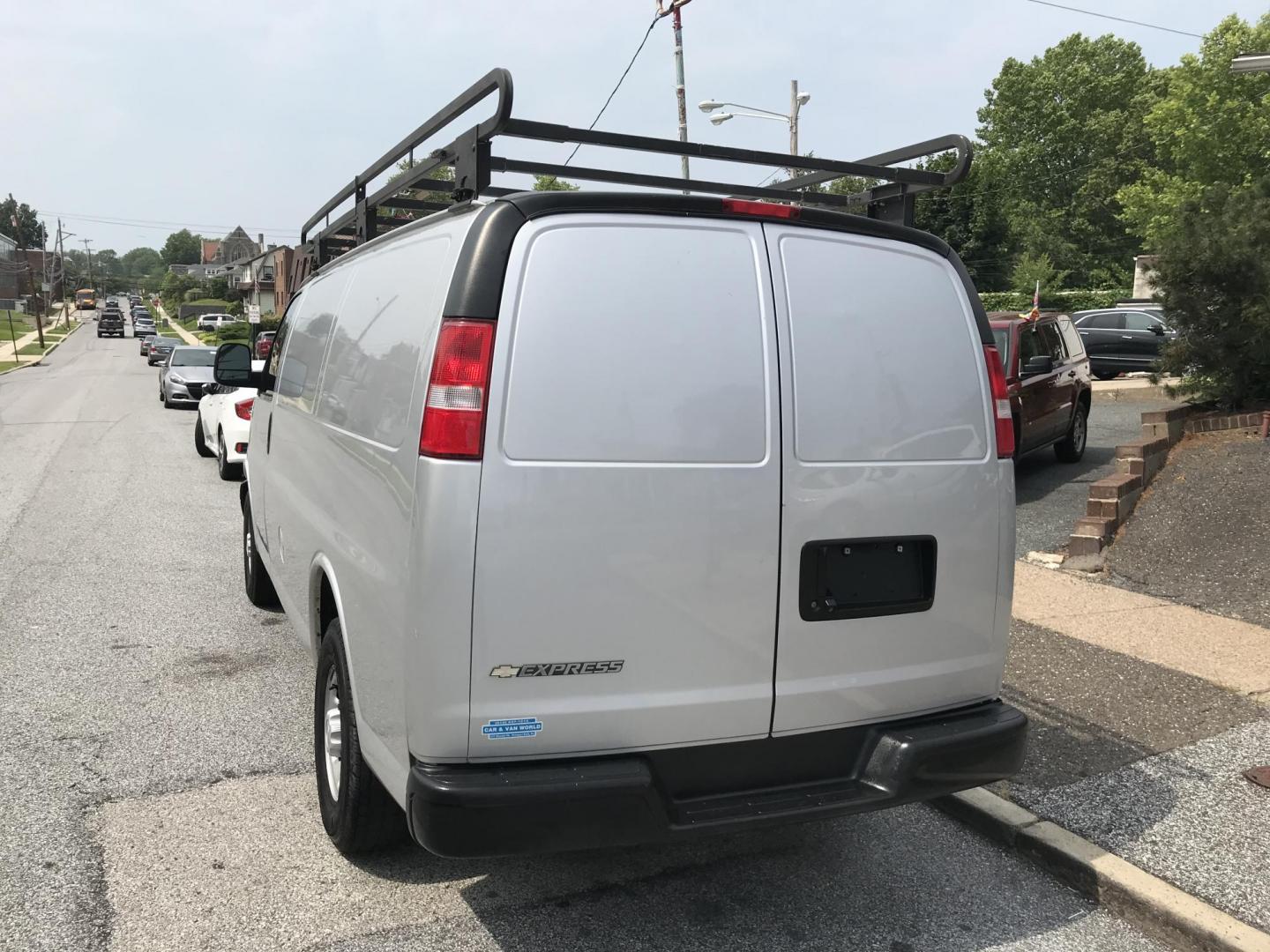 2018 Silver /Gray Chevrolet Express 3500 Cargo (1GCZGGFG3J1) with an 6.0L V8 OHV 16V FFV engine, 6A transmission, located at 577 Chester Pike, Prospect Park, PA, 19076, (610) 237-1015, 39.886154, -75.302338 - 2018 Chevrolet Express 3500 Cargo Van: Ladder racks, shelving, no side or rear windows, new PA inspection, runs LIKE NEW! This vehicle comes inspected and has been given a bumper to bumper safety check. It is very clean, reliable, and well maintained. We offer a unique pay plan that is known for - Photo#5