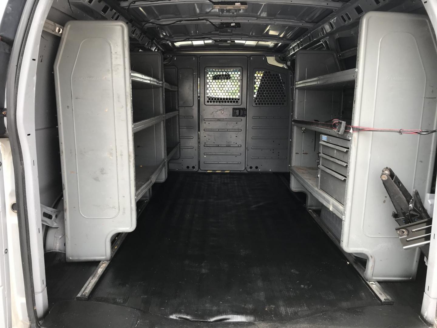 2018 Silver /Gray Chevrolet Express 3500 Cargo (1GCZGGFG3J1) with an 6.0L V8 OHV 16V FFV engine, 6A transmission, located at 577 Chester Pike, Prospect Park, PA, 19076, (610) 237-1015, 39.886154, -75.302338 - 2018 Chevrolet Express 3500 Cargo Van: Ladder racks, shelving, no side or rear windows, new PA inspection, runs LIKE NEW! This vehicle comes inspected and has been given a bumper to bumper safety check. It is very clean, reliable, and well maintained. We offer a unique pay plan that is known for - Photo#13