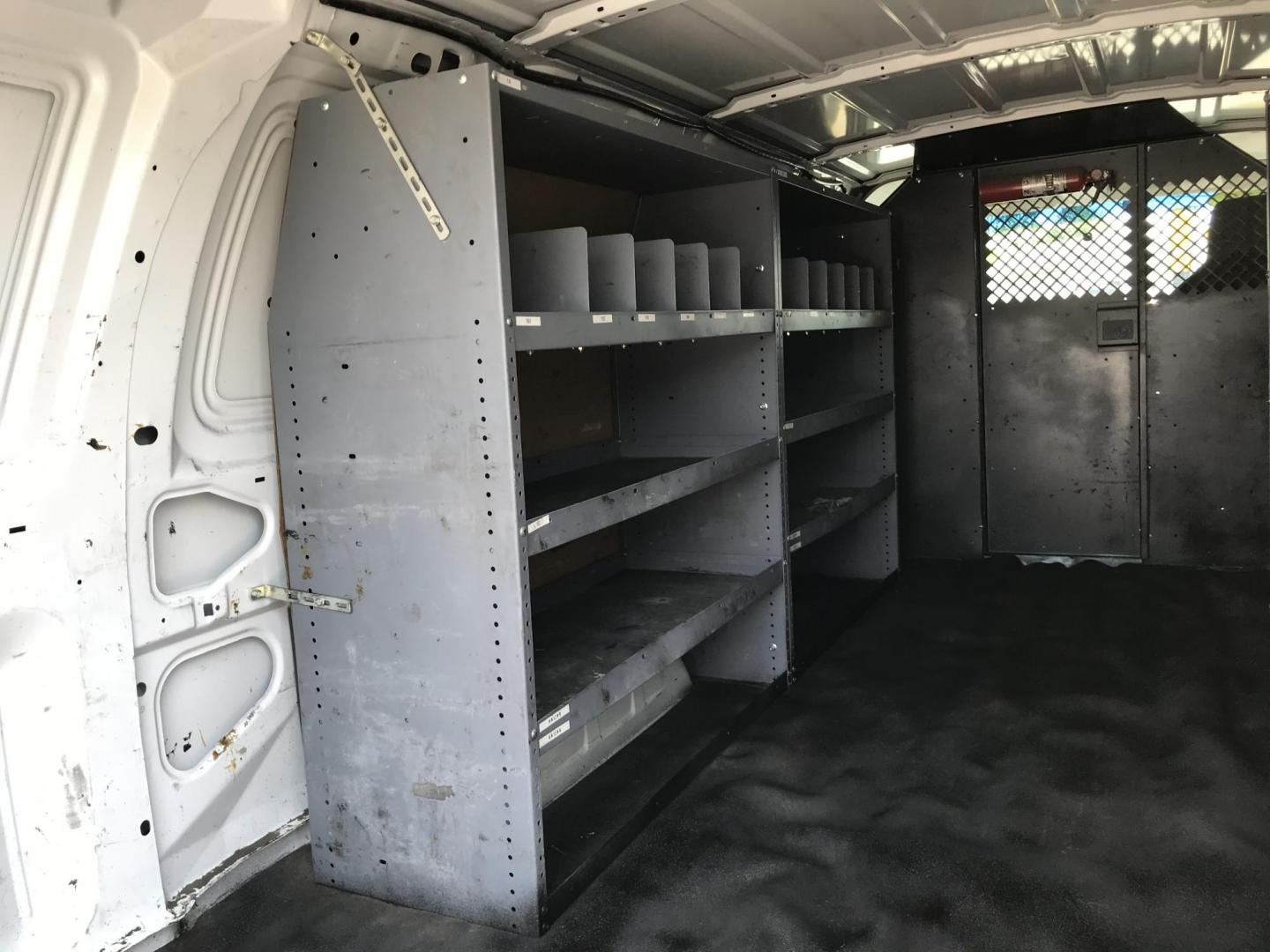2013 White /Gray Ford E-Series Van E-350 Super Duty Extended (1FTSS3EL7DD) with an 5.4L V8 SOHC 16V FFV engine, 6-Speed Automatic transmission, located at 577 Chester Pike, Prospect Park, PA, 19076, (610) 237-1015, 39.886154, -75.302338 - 2013 Ford E350 Extended Body: No side or rear windows, shelving, new PA inspection, partition, runs LIKE NEW! This vehicle comes inspected and has been given a bumper to bumper safety check. It is very clean, reliable, and well maintained. We offer a unique pay plan that is known for being the ea - Photo#17