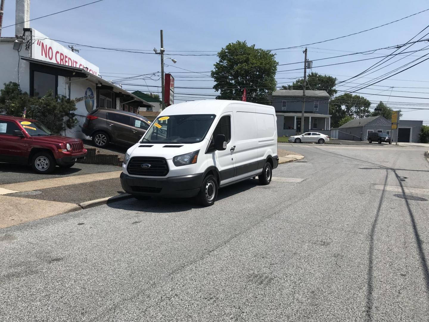 2017 White /Gray Ford Transit 250 Van Med. Roof w/Sliding Pass. 148-in. WB (1FTYR2CM3HK) with an 3.7L V6 DOHC 24V engine, 6A transmission, located at 577 Chester Pike, Prospect Park, PA, 19076, (610) 237-1015, 39.886154, -75.302338 - 2017 Ford Transit 250 Medium Roof: Multiple pieces of shelving, work bench, partition, new PA inspection, FLEET MAINTAINED! This vehicle comes inspected and has been given a bumper to bumper safety check. It is very clean, reliable, and well maintained. We offer a unique pay plan that is known fo - Photo#1