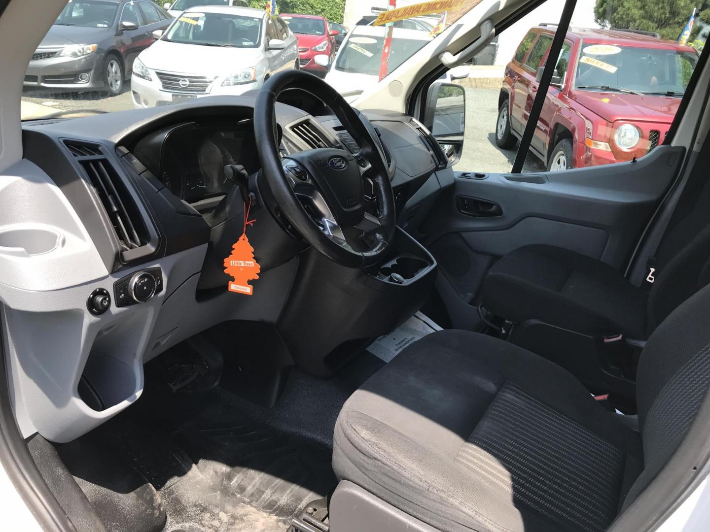 2017 White /Gray Ford Transit 250 Van Med. Roof w/Sliding Pass. 148-in. WB (1FTYR2CM3HK) with an 3.7L V6 DOHC 24V engine, 6A transmission, located at 577 Chester Pike, Prospect Park, PA, 19076, (610) 237-1015, 39.886154, -75.302338 - 2017 Ford Transit 250 Medium Roof: Multiple pieces of shelving, work bench, partition, new PA inspection, FLEET MAINTAINED! This vehicle comes inspected and has been given a bumper to bumper safety check. It is very clean, reliable, and well maintained. We offer a unique pay plan that is known fo - Photo#7