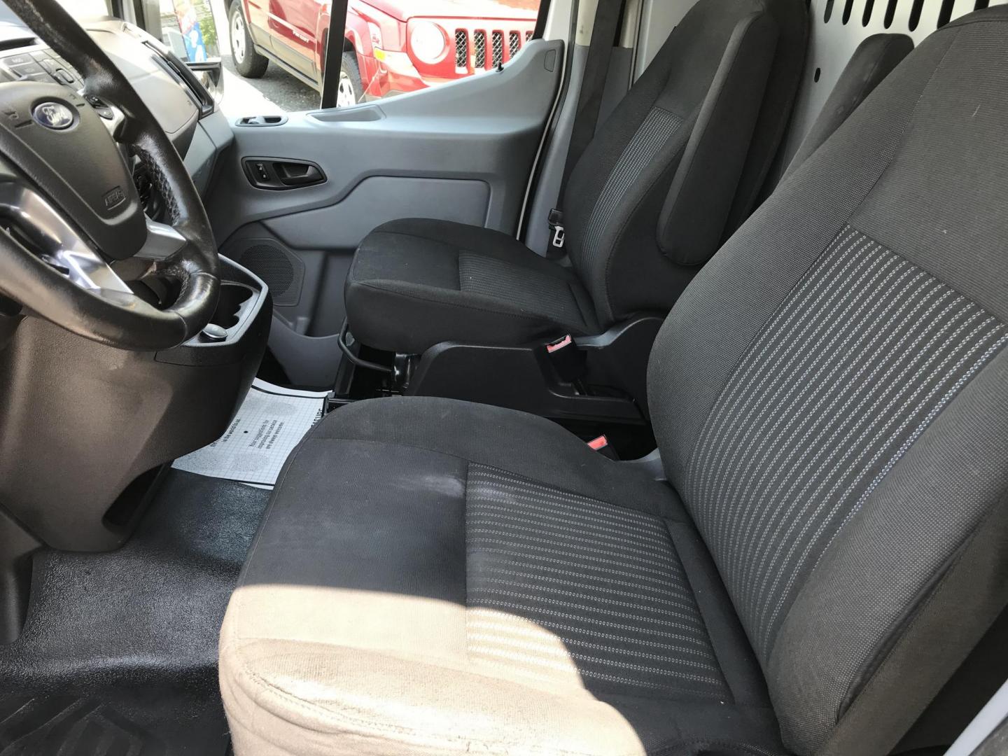 2017 White /Gray Ford Transit 250 Van Med. Roof w/Sliding Pass. 148-in. WB (1FTYR2CM3HK) with an 3.7L V6 DOHC 24V engine, 6A transmission, located at 577 Chester Pike, Prospect Park, PA, 19076, (610) 237-1015, 39.886154, -75.302338 - 2017 Ford Transit 250 Medium Roof: Multiple pieces of shelving, work bench, partition, new PA inspection, FLEET MAINTAINED! This vehicle comes inspected and has been given a bumper to bumper safety check. It is very clean, reliable, and well maintained. We offer a unique pay plan that is known fo - Photo#9