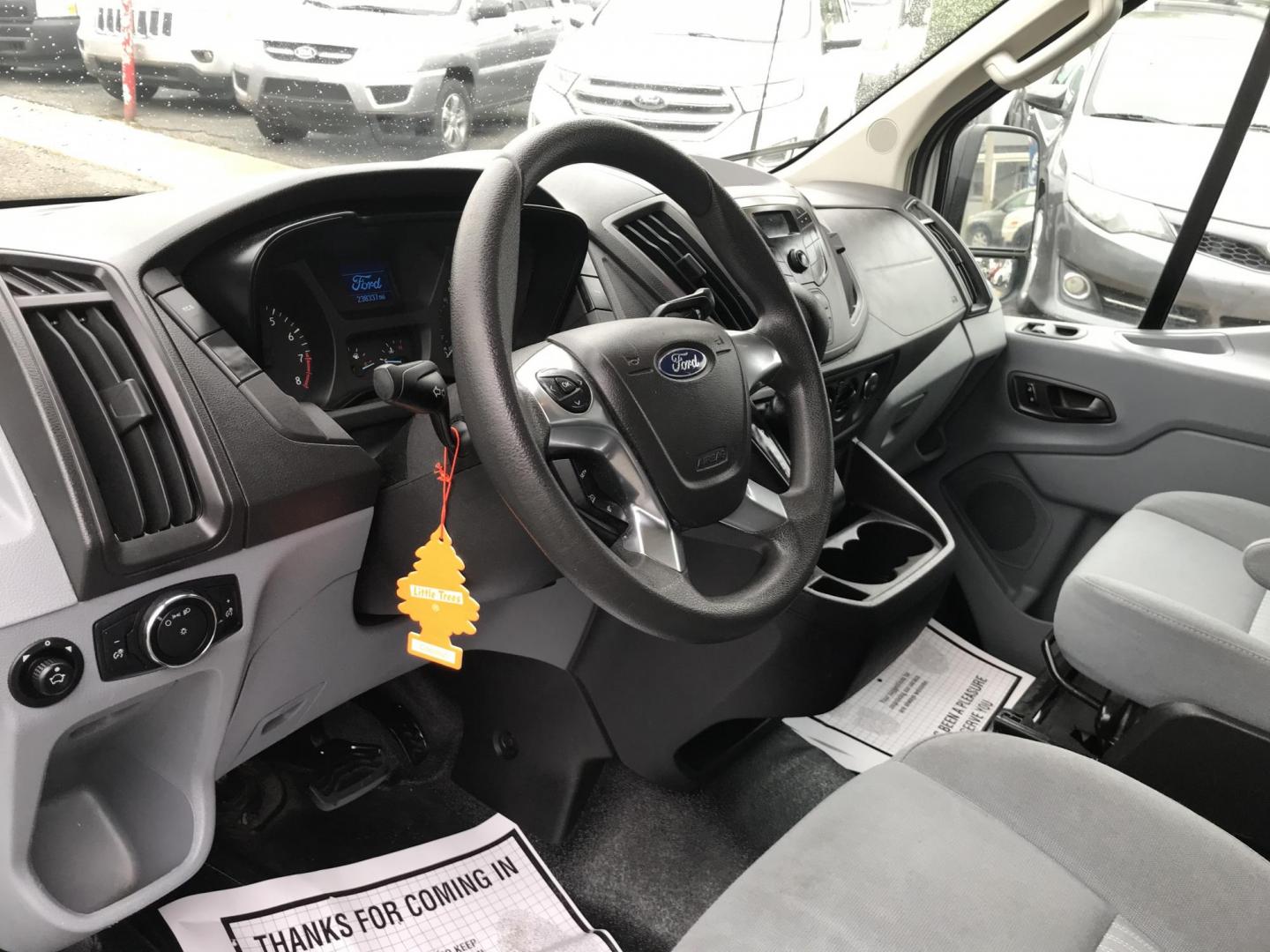 2015 White /Gray Ford Transit 150 Van Med. Roof w/Sliding Pass. 130-in. WB (1FTNE1CM3FK) with an 3.7L V6 DOHC 24V engine, 6-Speed Automatic transmission, located at 577 Chester Pike, Prospect Park, PA, 19076, (610) 237-1015, 39.886154, -75.302338 - 2015 Ford Transit Medium Roof: Fleet maintained van, new PA inspection, runs LIKE NEW! This vehicle comes inspected and has been given a bumper to bumper safety check. It is very clean, reliable, and well maintained. We offer a unique pay plan that is known for being the easiest and fastest finan - Photo#11