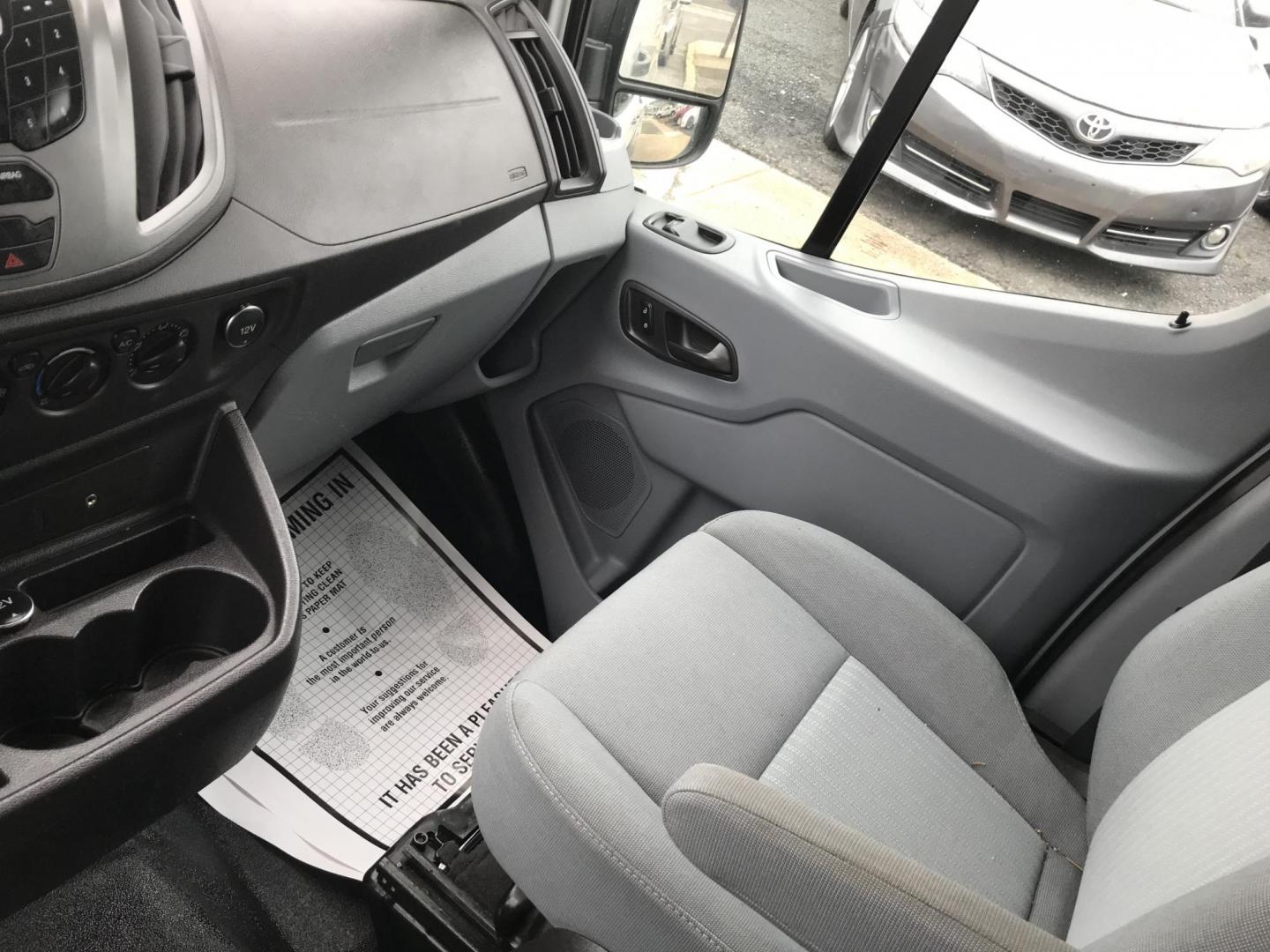 2015 White /Gray Ford Transit 150 Van Med. Roof w/Sliding Pass. 130-in. WB (1FTNE1CM3FK) with an 3.7L V6 DOHC 24V engine, 6-Speed Automatic transmission, located at 577 Chester Pike, Prospect Park, PA, 19076, (610) 237-1015, 39.886154, -75.302338 - 2015 Ford Transit Medium Roof: Fleet maintained van, new PA inspection, runs LIKE NEW! This vehicle comes inspected and has been given a bumper to bumper safety check. It is very clean, reliable, and well maintained. We offer a unique pay plan that is known for being the easiest and fastest finan - Photo#14