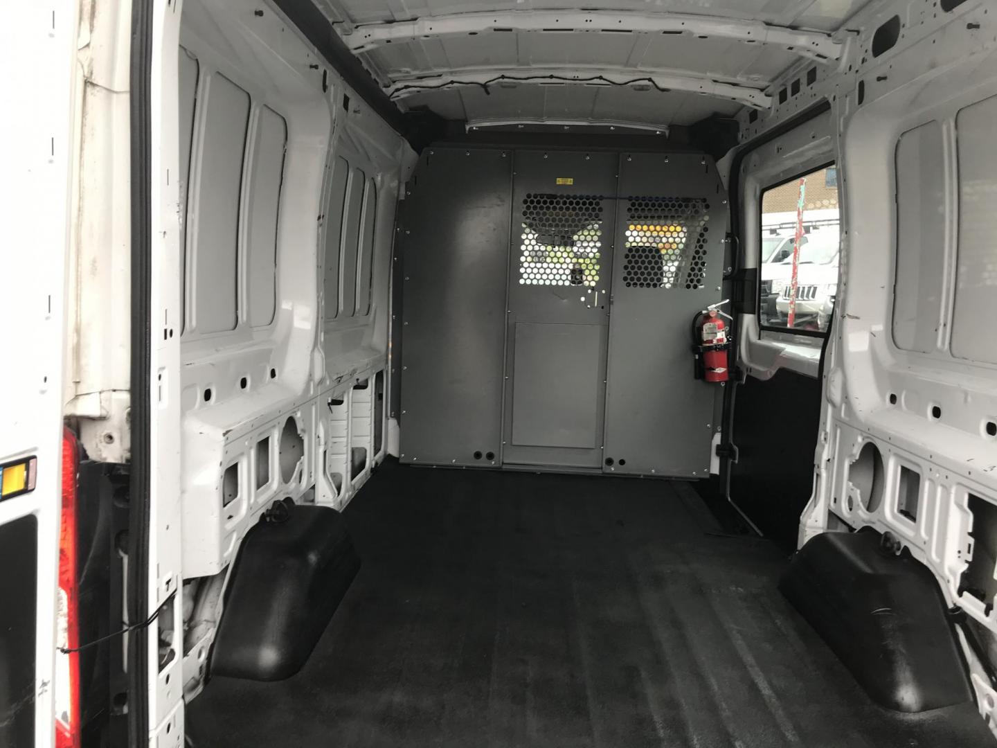 2015 White /Gray Ford Transit 150 Van Med. Roof w/Sliding Pass. 130-in. WB (1FTNE1CM3FK) with an 3.7L V6 DOHC 24V engine, 6-Speed Automatic transmission, located at 577 Chester Pike, Prospect Park, PA, 19076, (610) 237-1015, 39.886154, -75.302338 - 2015 Ford Transit Medium Roof: Fleet maintained van, new PA inspection, runs LIKE NEW! This vehicle comes inspected and has been given a bumper to bumper safety check. It is very clean, reliable, and well maintained. We offer a unique pay plan that is known for being the easiest and fastest finan - Photo#15