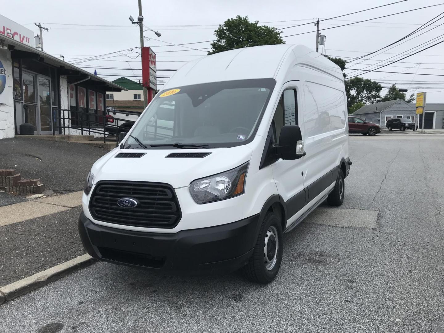 2016 White /Gray Ford Transit 350 Van High Roof w/Sliding Pass. 148-in. WB (1FTBW2XM2GK) with an 3.7L V6 DOHC 24V engine, 6A transmission, located at 577 Chester Pike, Prospect Park, PA, 19076, (610) 237-1015, 39.886154, -75.302338 - 2016 Ford Transit 350 High Roof: Has multiple pieces of shelving, 4 new tires, new PA inspection, backup camera, FLEET MAINTAINED! This vehicle comes inspected and has been given a bumper to bumper safety check. It is very clean, reliable, and well maintained. We offer a unique pay plan that is k - Photo#2