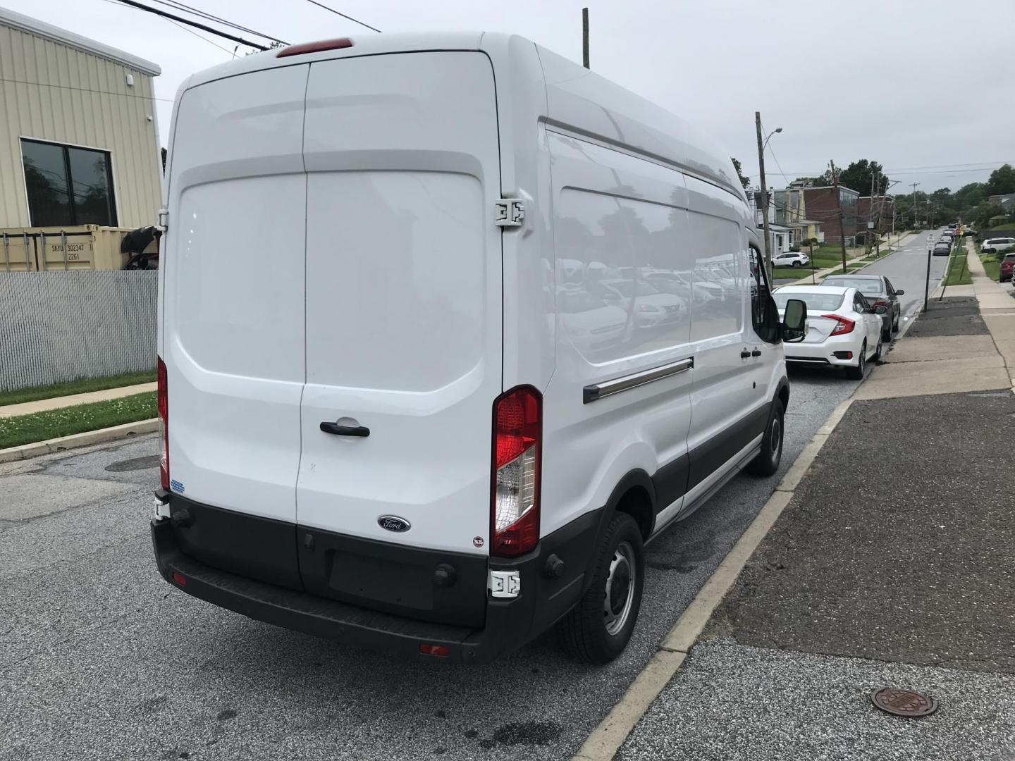 2016 White /Gray Ford Transit 350 Van High Roof w/Sliding Pass. 148-in. WB (1FTBW2XM2GK) with an 3.7L V6 DOHC 24V engine, 6A transmission, located at 577 Chester Pike, Prospect Park, PA, 19076, (610) 237-1015, 39.886154, -75.302338 - 2016 Ford Transit 350 High Roof: Has multiple pieces of shelving, 4 new tires, new PA inspection, backup camera, FLEET MAINTAINED! This vehicle comes inspected and has been given a bumper to bumper safety check. It is very clean, reliable, and well maintained. We offer a unique pay plan that is k - Photo#4