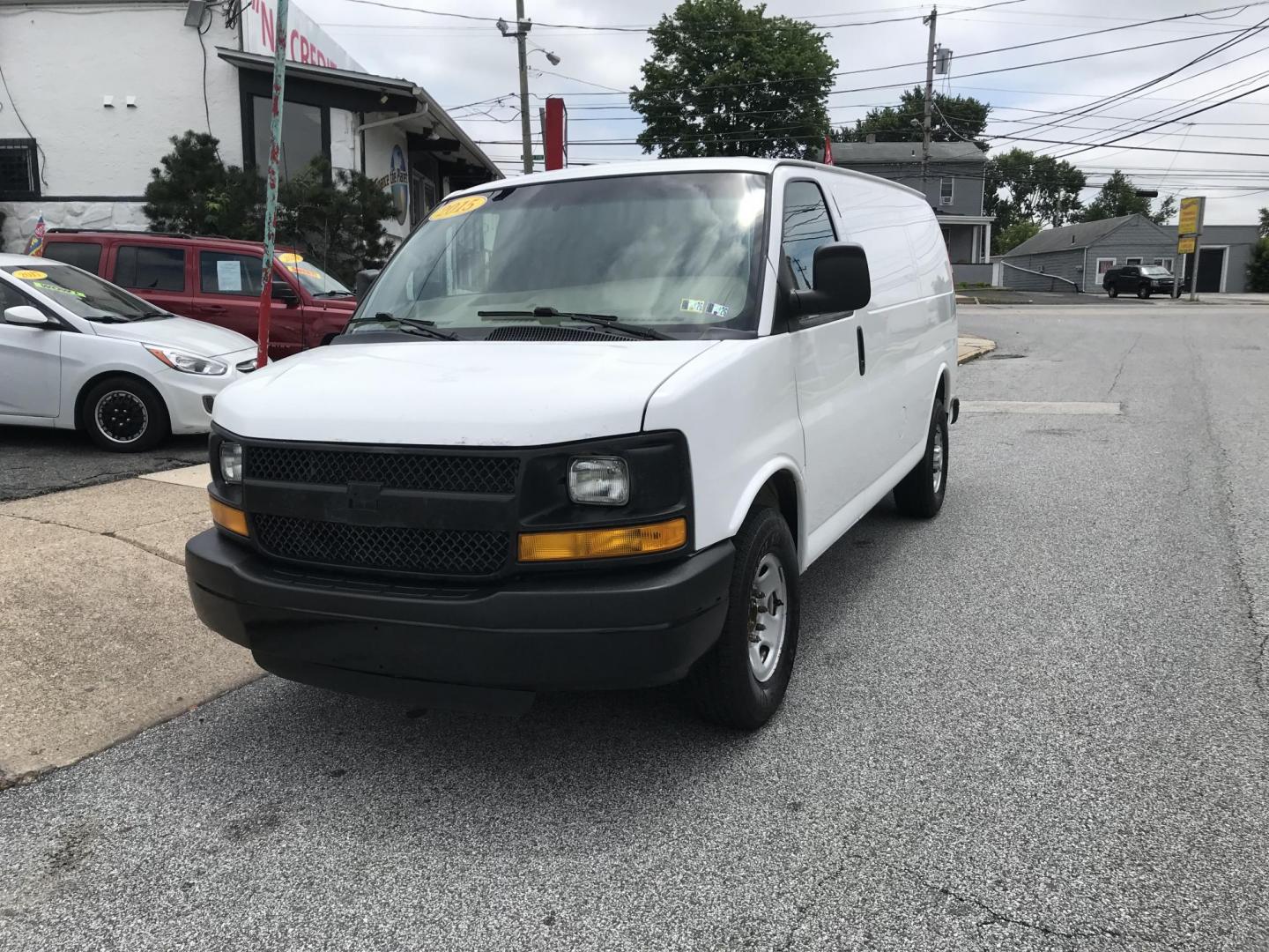 2015 White /Gray Chevrolet Express 2500 Cargo FFV (1GCWGFCG3F1) with an 6.0L V8 OHV 16V FFV engine, 6-Speed Automatic transmission, located at 577 Chester Pike, Prospect Park, PA, 19076, (610) 237-1015, 39.886154, -75.302338 - 2015 Chevrolet Express 2500: Has shelving, partition, new PA inspection, no side or rear windows, runs LIKE NEW! vehicle comes inspected and has been given a bumper to bumper safety check. It is very clean, reliable, and well maintained. We offer a unique pay plan that is known for being the easi - Photo#2