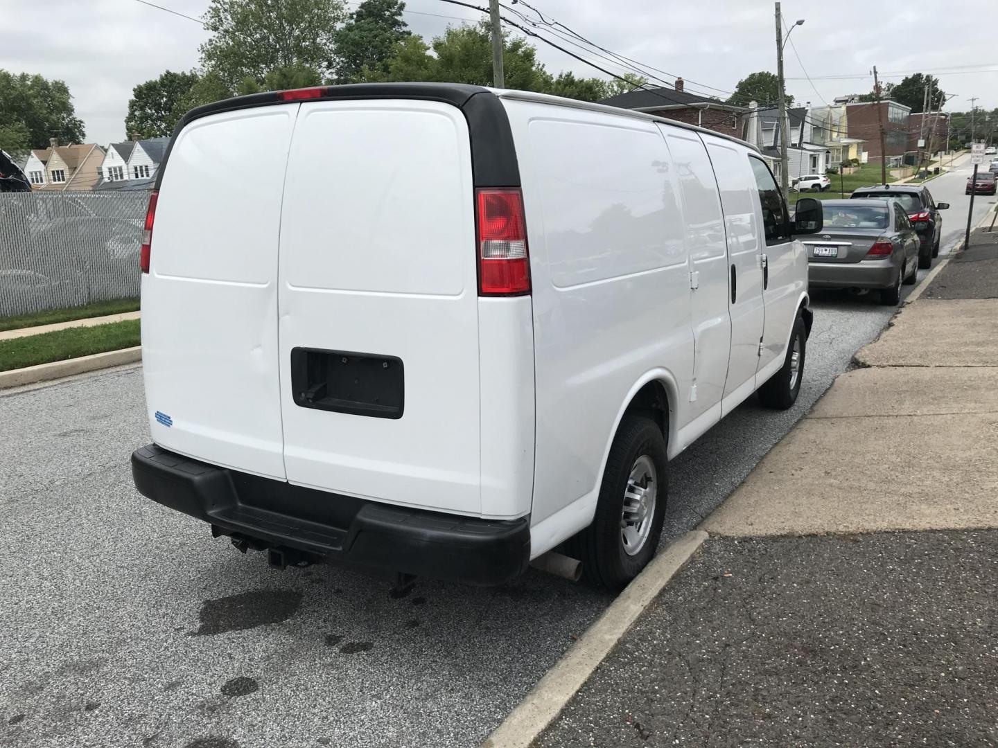 2015 White /Gray Chevrolet Express 2500 Cargo FFV (1GCWGFCG3F1) with an 6.0L V8 OHV 16V FFV engine, 6-Speed Automatic transmission, located at 577 Chester Pike, Prospect Park, PA, 19076, (610) 237-1015, 39.886154, -75.302338 - 2015 Chevrolet Express 2500: Has shelving, partition, new PA inspection, no side or rear windows, runs LIKE NEW! vehicle comes inspected and has been given a bumper to bumper safety check. It is very clean, reliable, and well maintained. We offer a unique pay plan that is known for being the easi - Photo#4