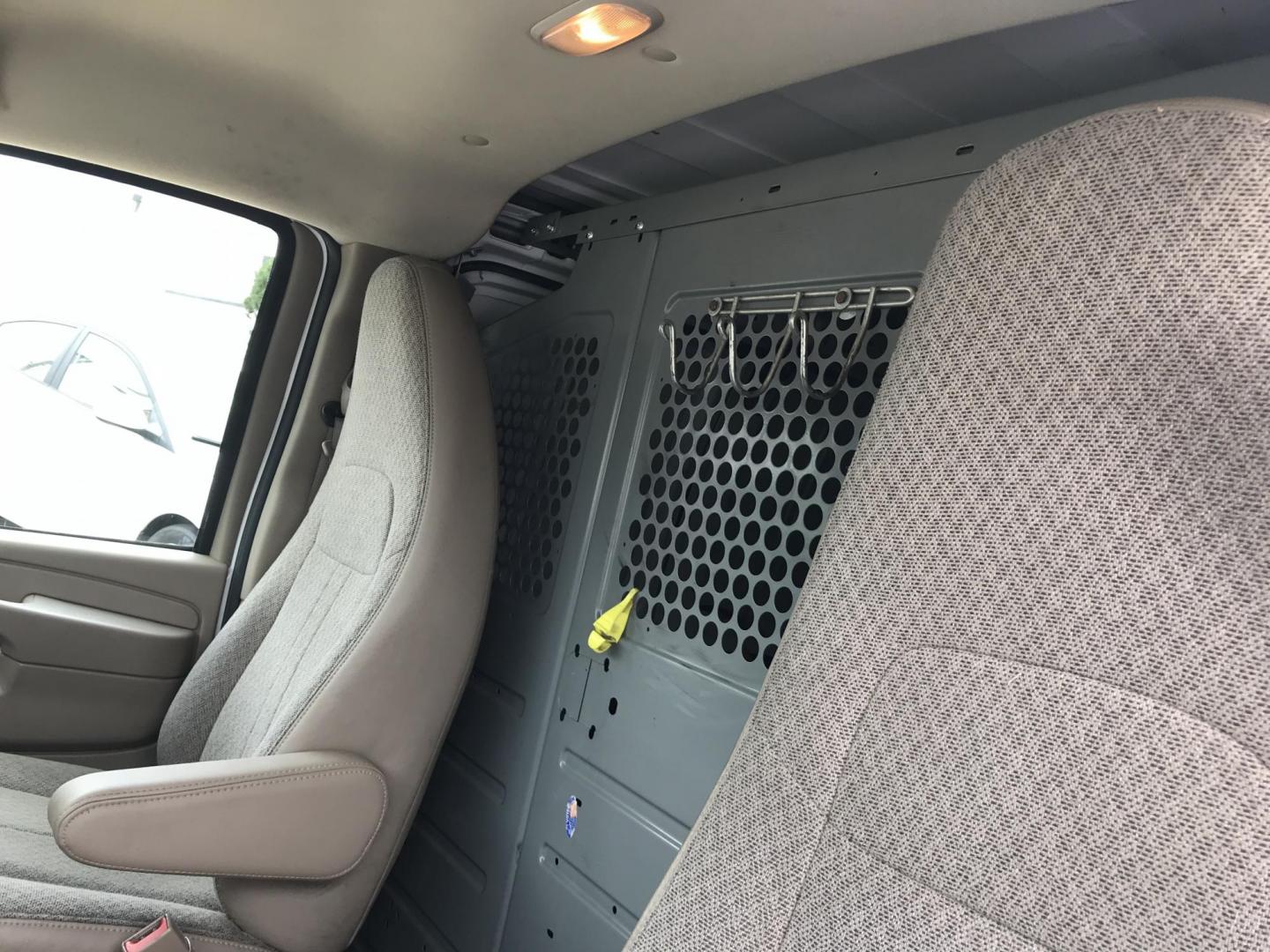 2015 White /Gray Chevrolet Express 2500 Cargo FFV (1GCWGFCG3F1) with an 6.0L V8 OHV 16V FFV engine, 6-Speed Automatic transmission, located at 577 Chester Pike, Prospect Park, PA, 19076, (610) 237-1015, 39.886154, -75.302338 - 2015 Chevrolet Express 2500: Has shelving, partition, new PA inspection, no side or rear windows, runs LIKE NEW! vehicle comes inspected and has been given a bumper to bumper safety check. It is very clean, reliable, and well maintained. We offer a unique pay plan that is known for being the easi - Photo#10