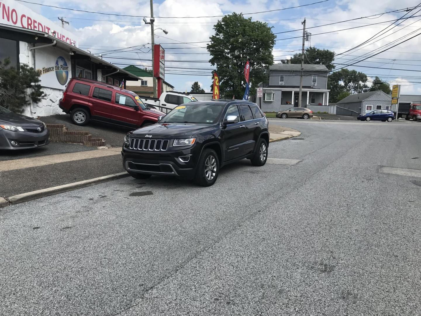 2014 Black /Black Jeep Grand Cherokee Limited 4WD (1C4RJFBG5EC) with an 3.6L V6 DOHC 24V engine, 5-Speed Automatic transmission, located at 577 Chester Pike, Prospect Park, PA, 19076, (610) 237-1015, 39.886154, -75.302338 - 2014 Jeep Grand Cherokee LIMITED: Navigation system, 4x4, backup camera, sunroof, black leather interior, SUPER CLEAN, runs LIKE NEW! This vehicle comes inspected and has been given a bumper to bumper safety check. It is very clean, reliable, and well maintained. We offer a unique pay plan that i - Photo#1
