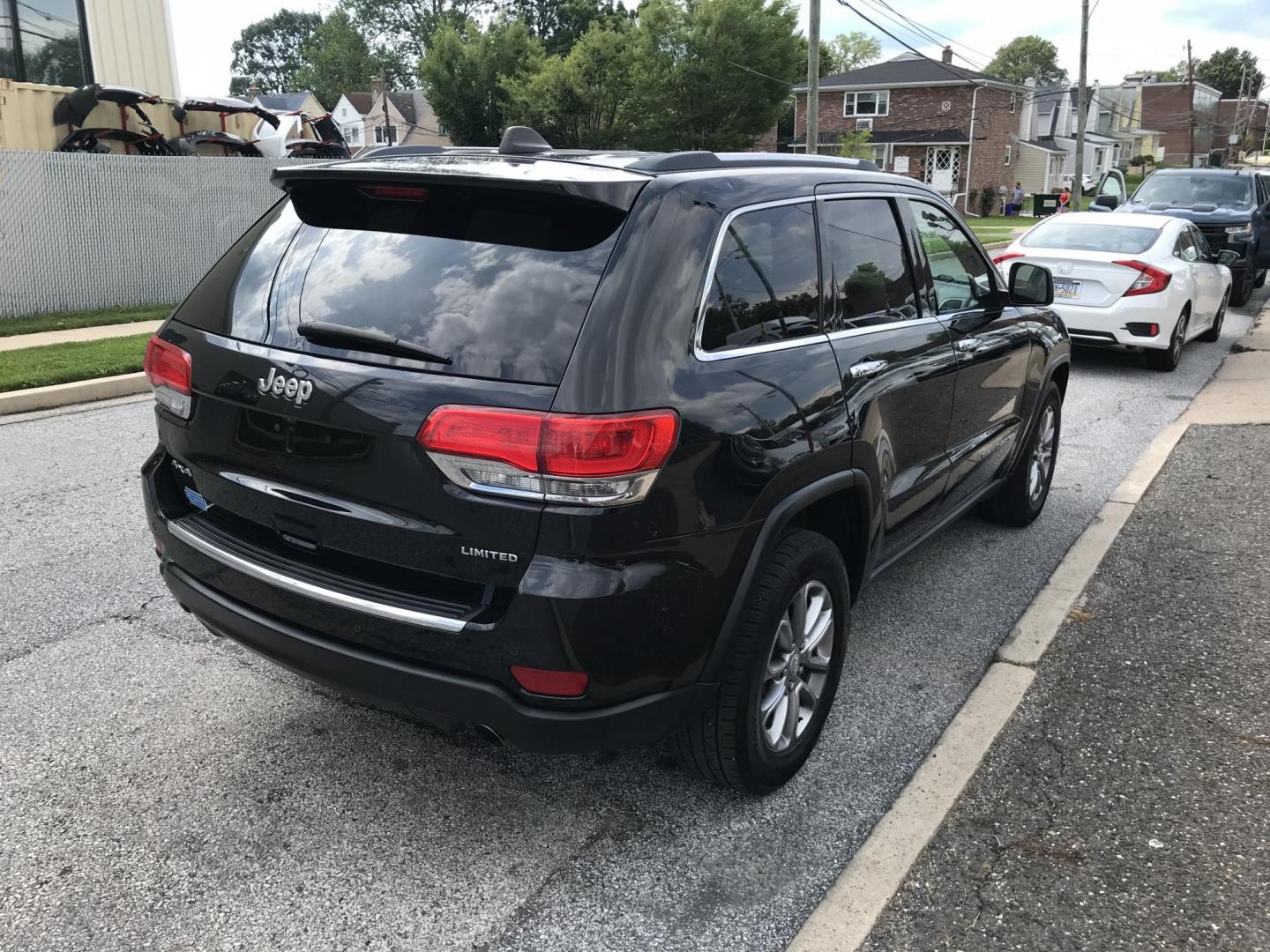 2014 Black /Black Jeep Grand Cherokee Limited 4WD (1C4RJFBG5EC) with an 3.6L V6 DOHC 24V engine, 5-Speed Automatic transmission, located at 577 Chester Pike, Prospect Park, PA, 19076, (610) 237-1015, 39.886154, -75.302338 - 2014 Jeep Grand Cherokee LIMITED: Navigation system, 4x4, backup camera, sunroof, black leather interior, SUPER CLEAN, runs LIKE NEW! This vehicle comes inspected and has been given a bumper to bumper safety check. It is very clean, reliable, and well maintained. We offer a unique pay plan that i - Photo#4