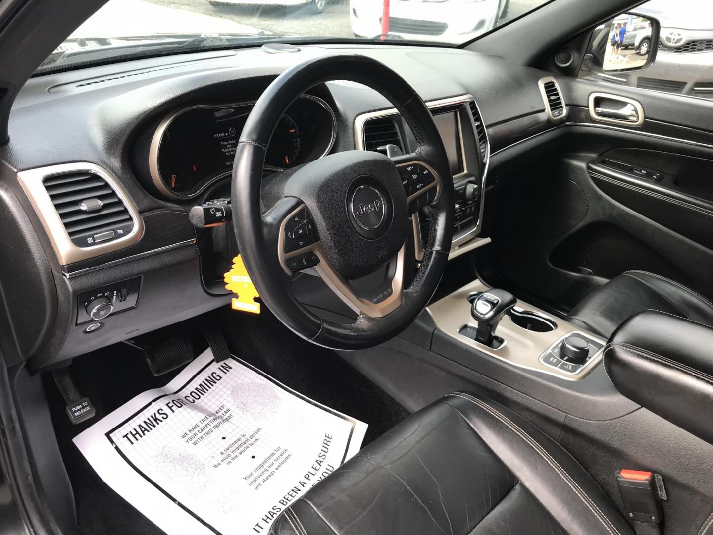 2014 Black /Black Jeep Grand Cherokee Limited 4WD (1C4RJFBG5EC) with an 3.6L V6 DOHC 24V engine, 5-Speed Automatic transmission, located at 577 Chester Pike, Prospect Park, PA, 19076, (610) 237-1015, 39.886154, -75.302338 - 2014 Jeep Grand Cherokee LIMITED: Navigation system, 4x4, backup camera, sunroof, black leather interior, SUPER CLEAN, runs LIKE NEW! This vehicle comes inspected and has been given a bumper to bumper safety check. It is very clean, reliable, and well maintained. We offer a unique pay plan that i - Photo#12