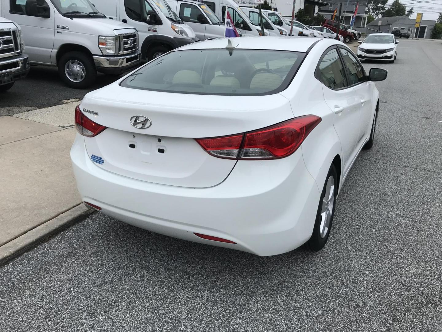2013 White /Tan Hyundai Elantra GLS (5NPDH4AE7DH) with an 1.8L L4 DOHC 16V engine, 6-Speed Automatic transmission, located at 577 Chester Pike, Prospect Park, PA, 19076, (610) 237-1015, 39.886154, -75.302338 - 2013 Hyundai Elantra GLS: Great on gas, new PA inspection, SUPER CLEAN, runs LIKE NEW! This vehicle comes inspected and has been given a bumper to bumper safety check. It is very clean, reliable, and well maintained. We offer a unique pay plan that is known for being the easiest and fastest finan - Photo#6