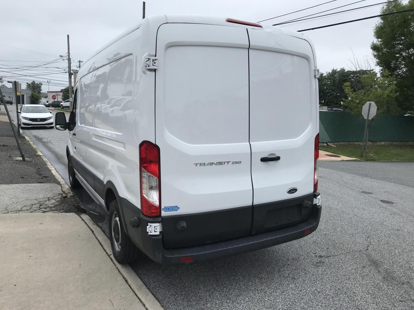2015 White /Gray Ford Transit 250 Van High Roof w/Sliding Pass. 148-in. WB (1FTNR2CM2FK) with an 3.7L V6 DOHC 24V engine, 6-Speed Automatic transmission, located at 577 Chester Pike, Prospect Park, PA, 19076, (610) 237-1015, 39.886154, -75.302338 - 2015 Ford Transit 250 Medium Roof: new PA inspection, multiple pieces of shelving, FLEET MAINTAINED, runs LIKE NEW! This vehicle comes inspected and has been given a bumper to bumper safety check. It is very clean, reliable, and well maintained. We offer a unique pay plan that is known for being - Photo#5
