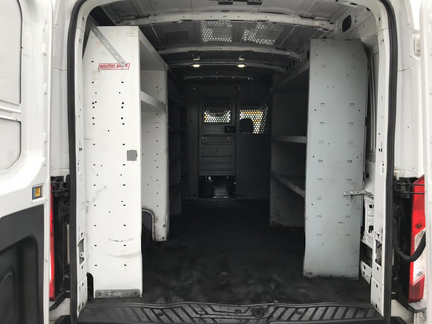 2015 White /Gray Ford Transit 250 Van High Roof w/Sliding Pass. 148-in. WB (1FTNR2CM2FK) with an 3.7L V6 DOHC 24V engine, 6-Speed Automatic transmission, located at 577 Chester Pike, Prospect Park, PA, 19076, (610) 237-1015, 39.886154, -75.302338 - 2015 Ford Transit 250 Medium Roof: new PA inspection, multiple pieces of shelving, FLEET MAINTAINED, runs LIKE NEW! This vehicle comes inspected and has been given a bumper to bumper safety check. It is very clean, reliable, and well maintained. We offer a unique pay plan that is known for being - Photo#15