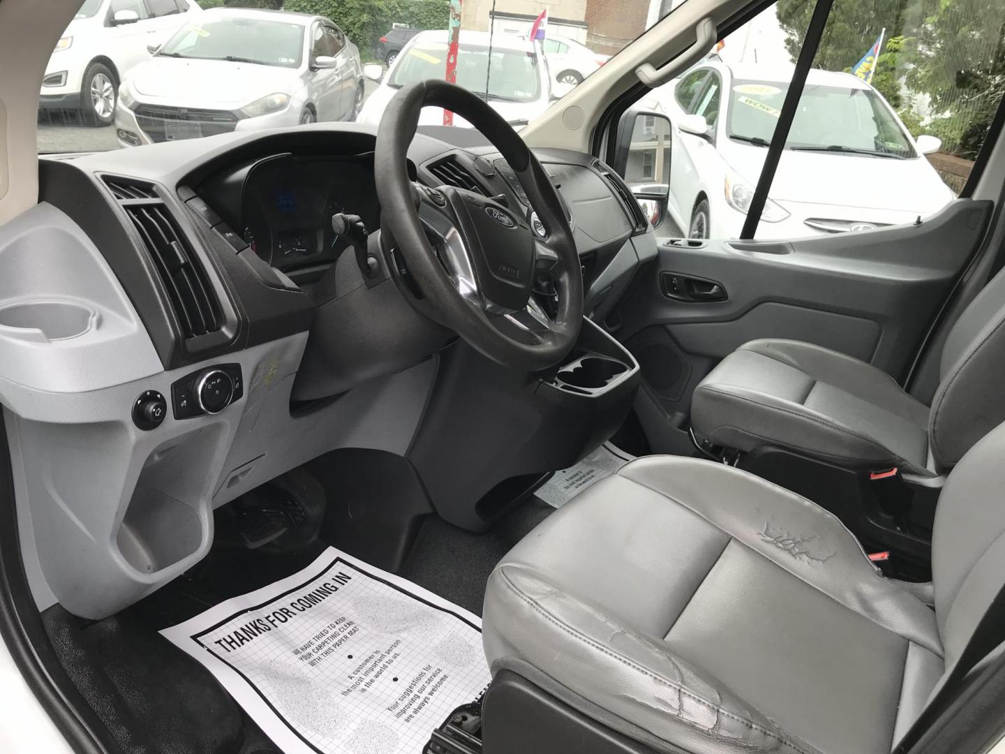 2016 White /Gray Ford Transit 250 Van Med. Roof w/Sliding Pass. 148-in. WB (1FTYR2CM1GK) with an 3.7L V6 DOHC 24V engine, 6-Speed Automatic transmission, located at 577 Chester Pike, Prospect Park, PA, 19076, (610) 237-1015, 39.886154, -75.302338 - 2016 Ford Transit 250 Medium Roof: Has shelving, new PA inspection, no side or rear windows, FLEET MAINTAINED, runs LIKE NEW! This vehicle comes inspected and has been given a bumper to bumper safety check. It is very clean, reliable, and well maintained. We offer a unique pay plan that is known - Photo#7