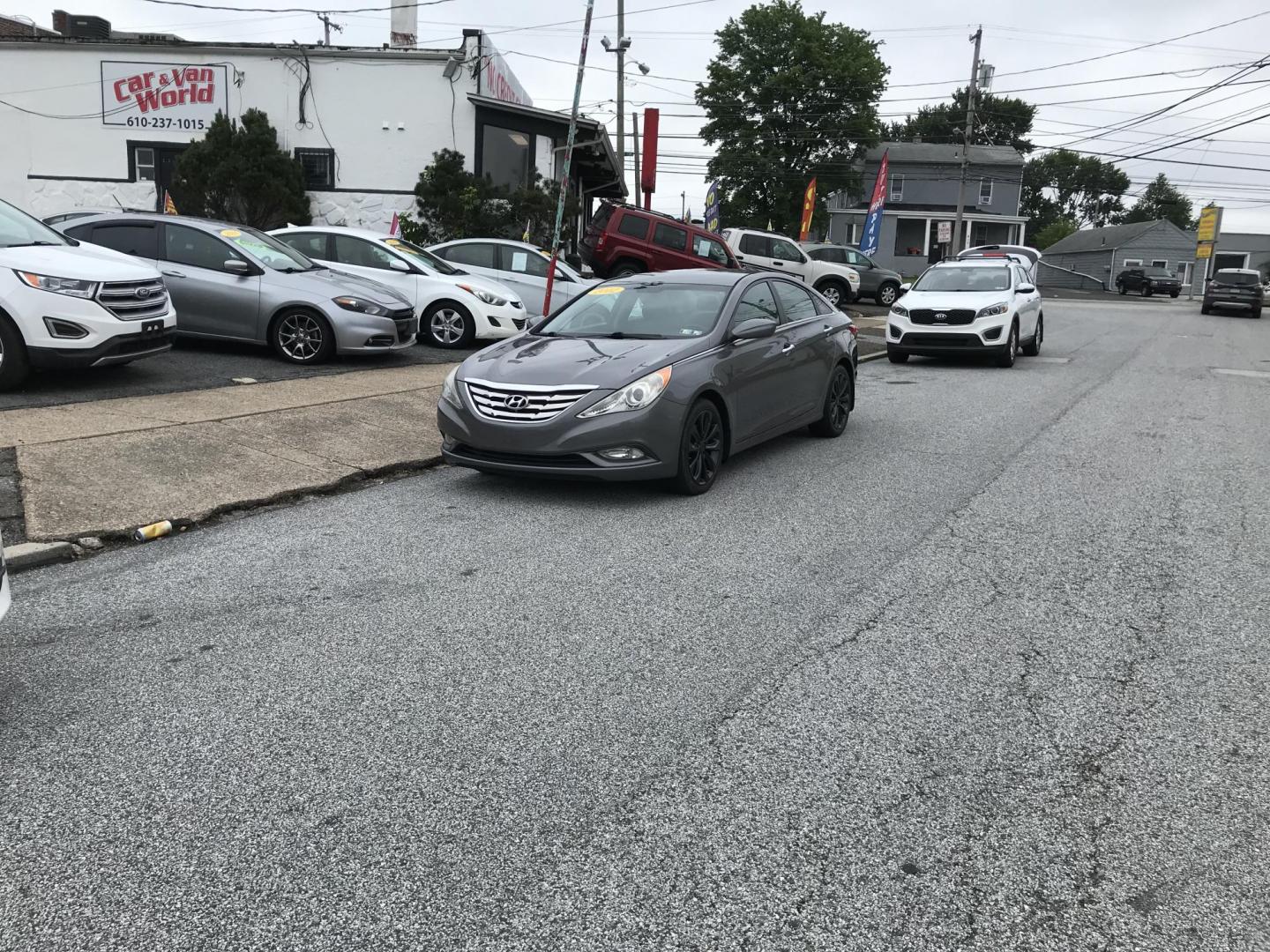2012 Gray /Gray Hyundai Sonata Limited Auto (5NPEC4AC4CH) with an 2.4L L4 DOHC 16V engine, 6-Speed Automatic transmission, located at 577 Chester Pike, Prospect Park, PA, 19076, (610) 237-1015, 39.886154, -75.302338 - 2012 Hyundai Sonata SE: Only 127k miles, new PA inspection, SUPER CLEAN, runs LIKE NEW! This vehicle comes inspected and has been given a bumper to bumper safety check. It is very clean, reliable, and well maintained. We offer a unique pay plan that is known for being the easiest and fastest fina - Photo#1